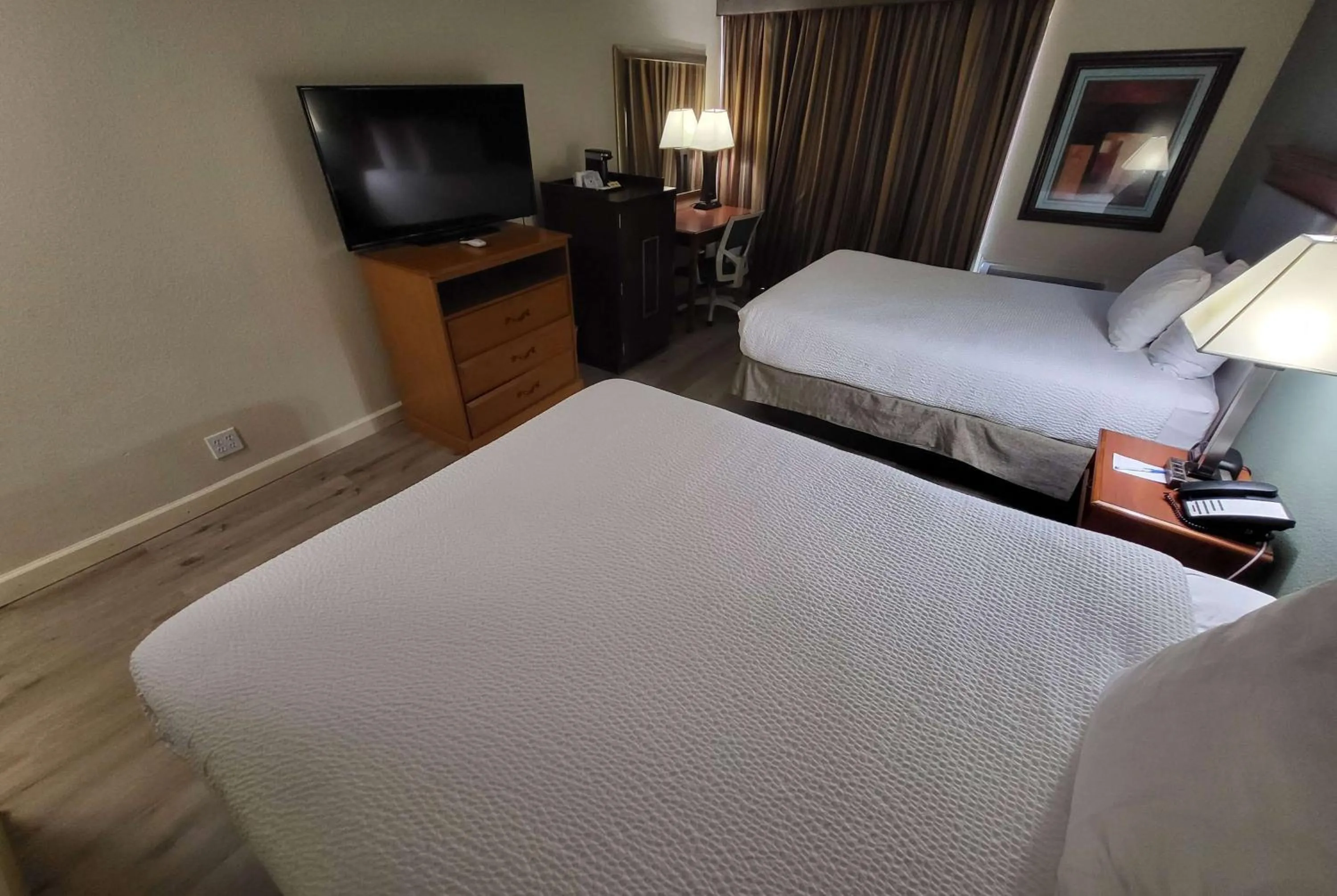 Photo of the whole room, Bed in Ramada by Wyndham Houston Intercontinental Airport East