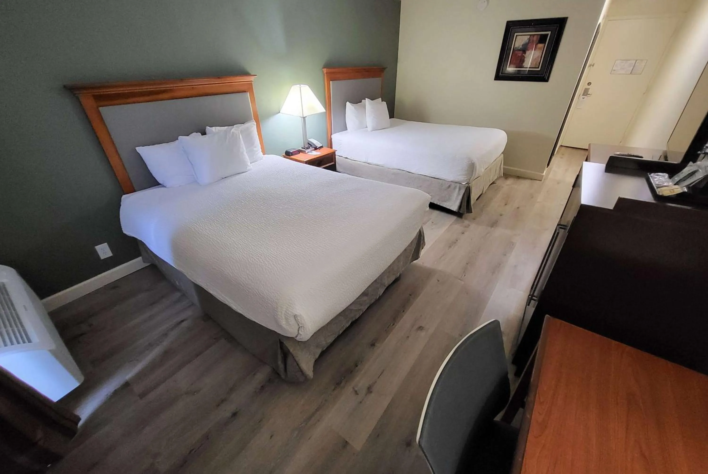 Photo of the whole room, Bed in Ramada by Wyndham Houston Intercontinental Airport East