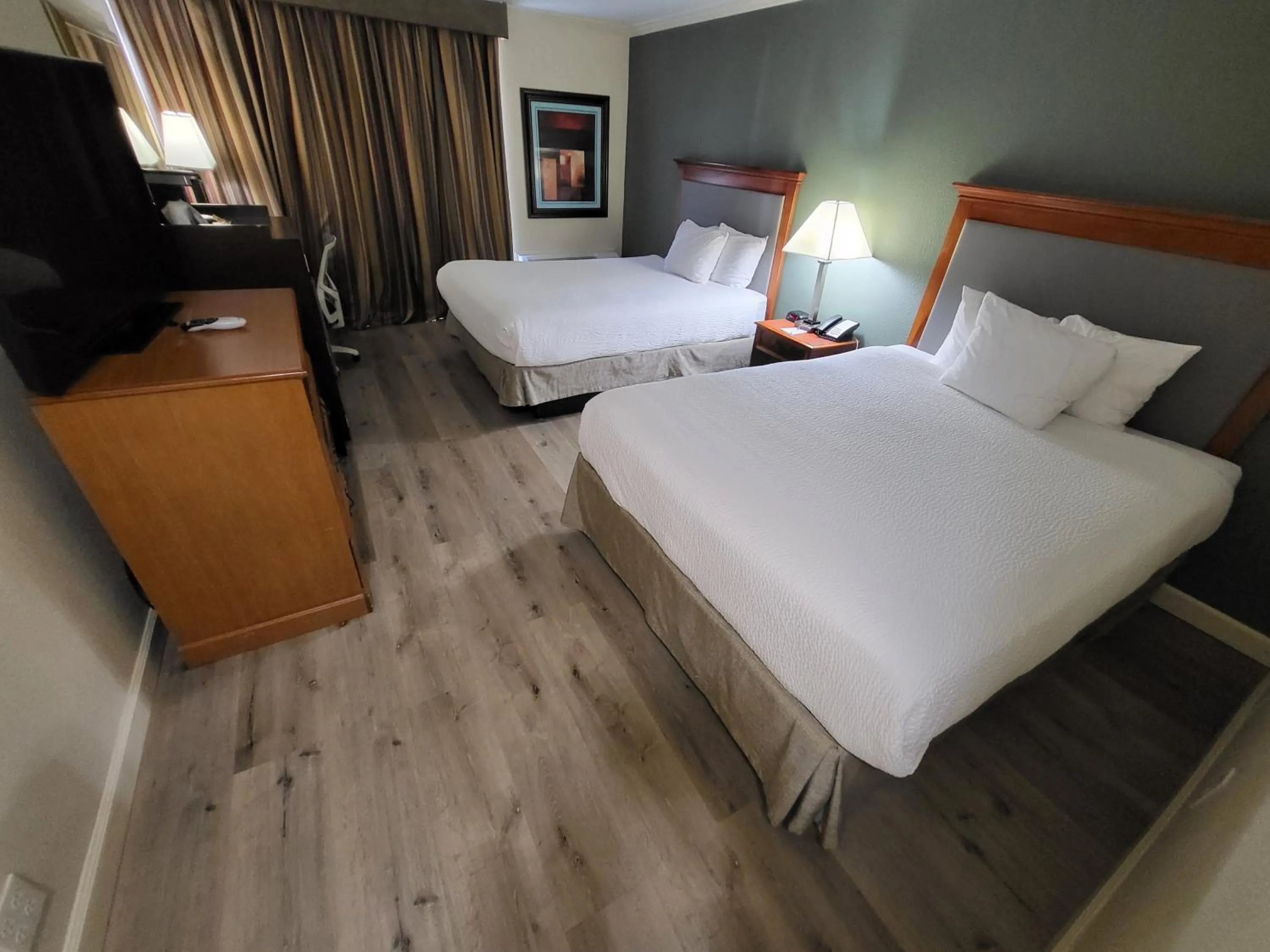 Bed in Ramada by Wyndham Houston Intercontinental Airport East