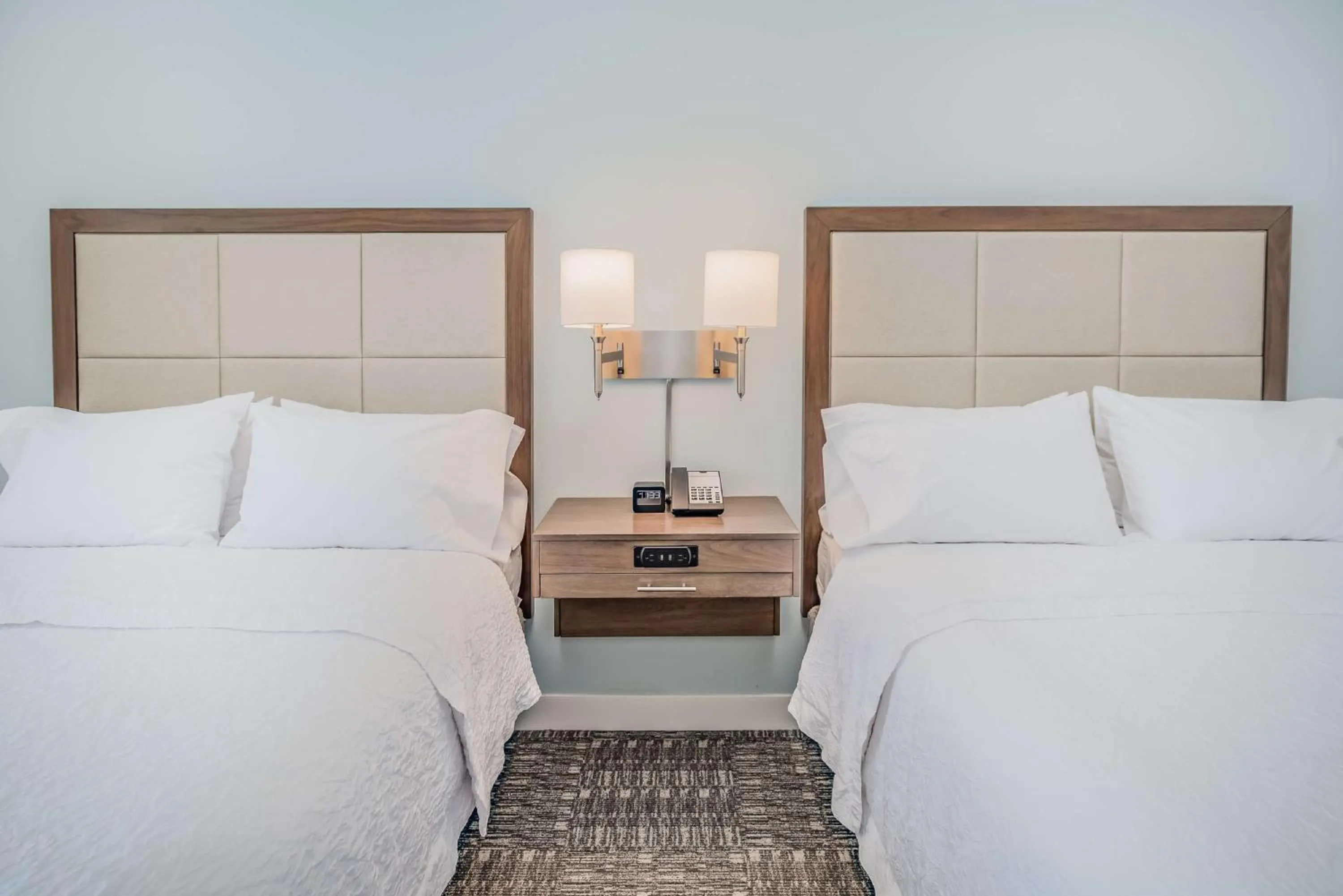 Bed in Hampton Inn & Suites Panama City Beach-Beachfront