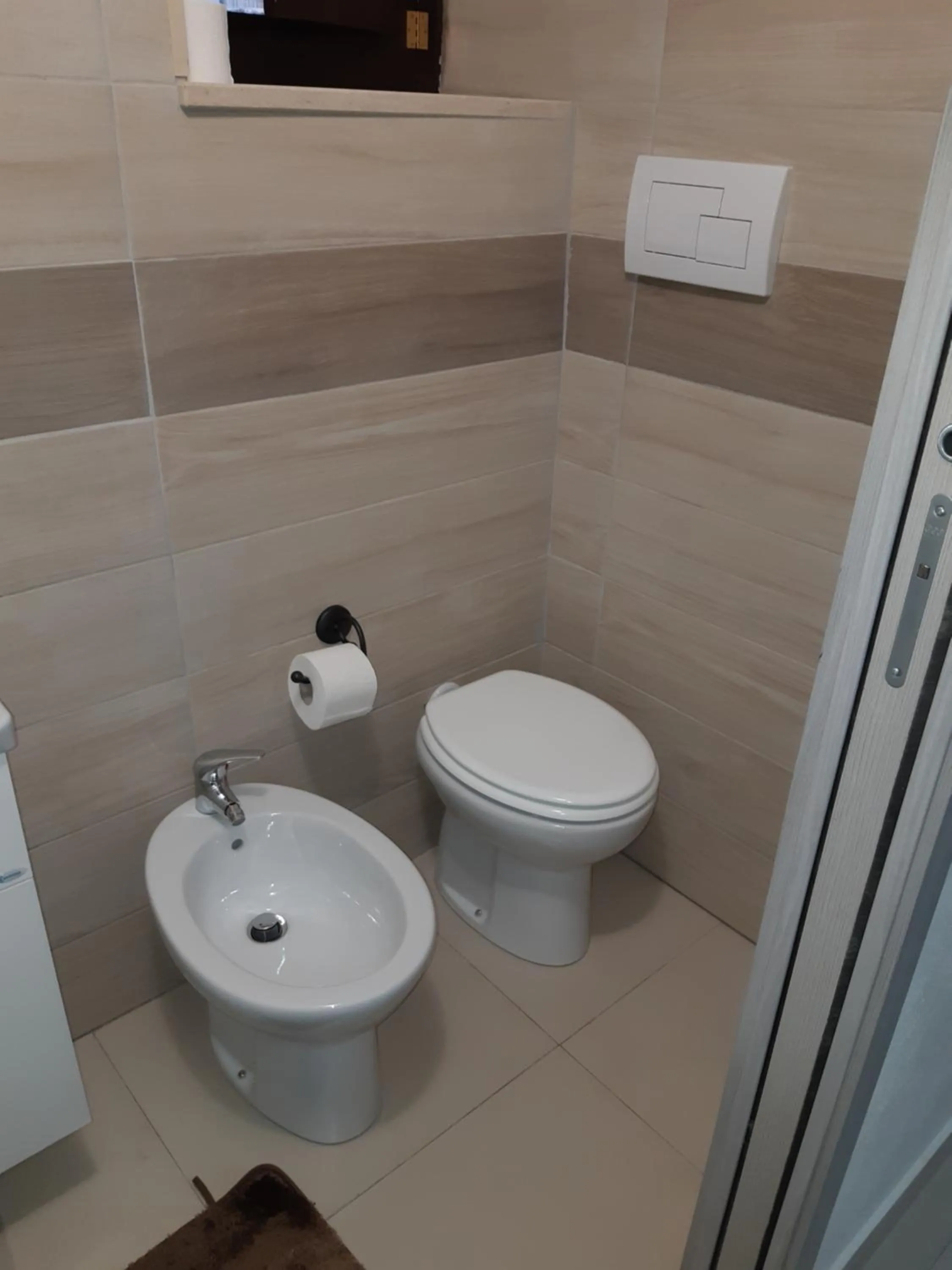 Toilet in LUTRI Home