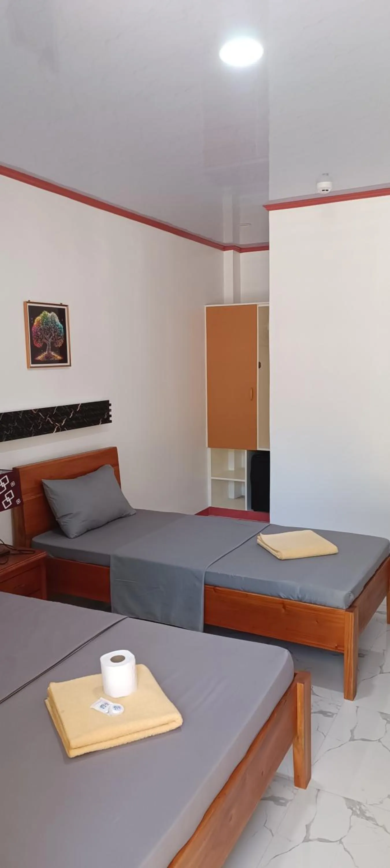 Bed in Alona J&J Tourist Inn