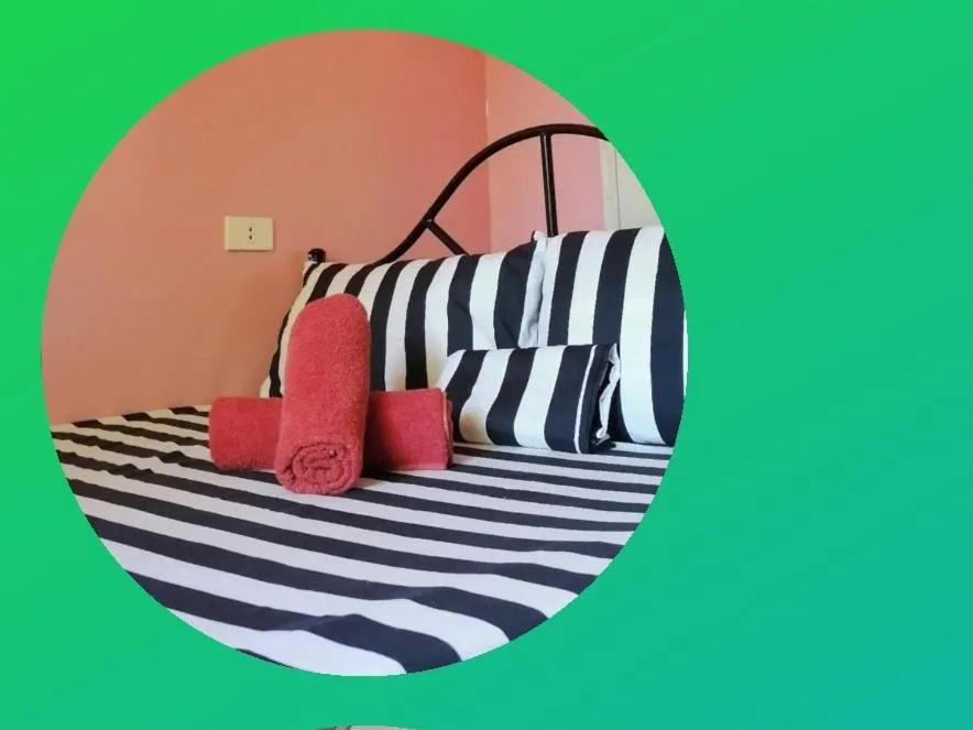 Bedroom in Alona J&J Tourist Inn