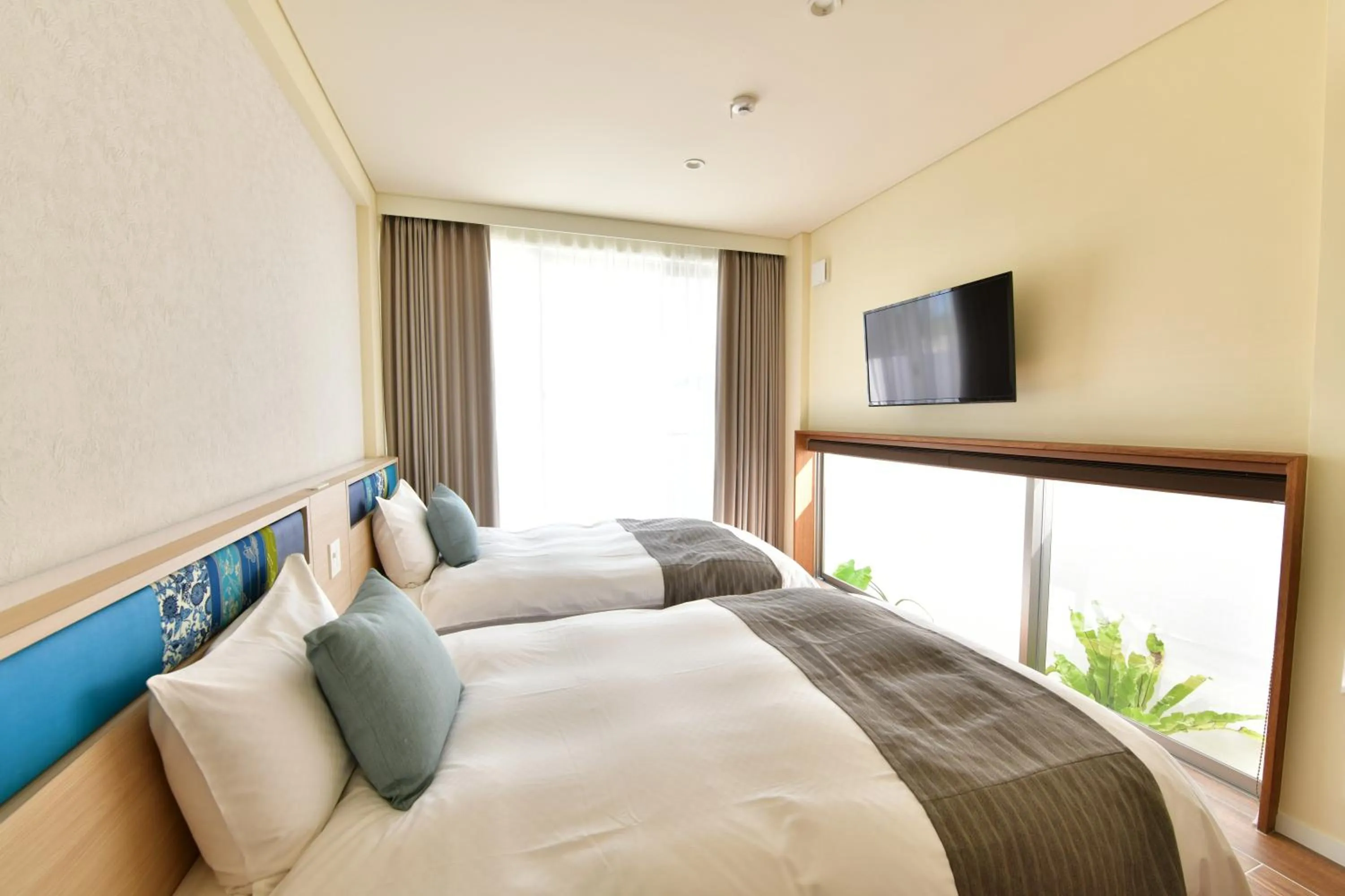 Bedroom, Bed in Feliz Villa Suite Irabujima Sawada