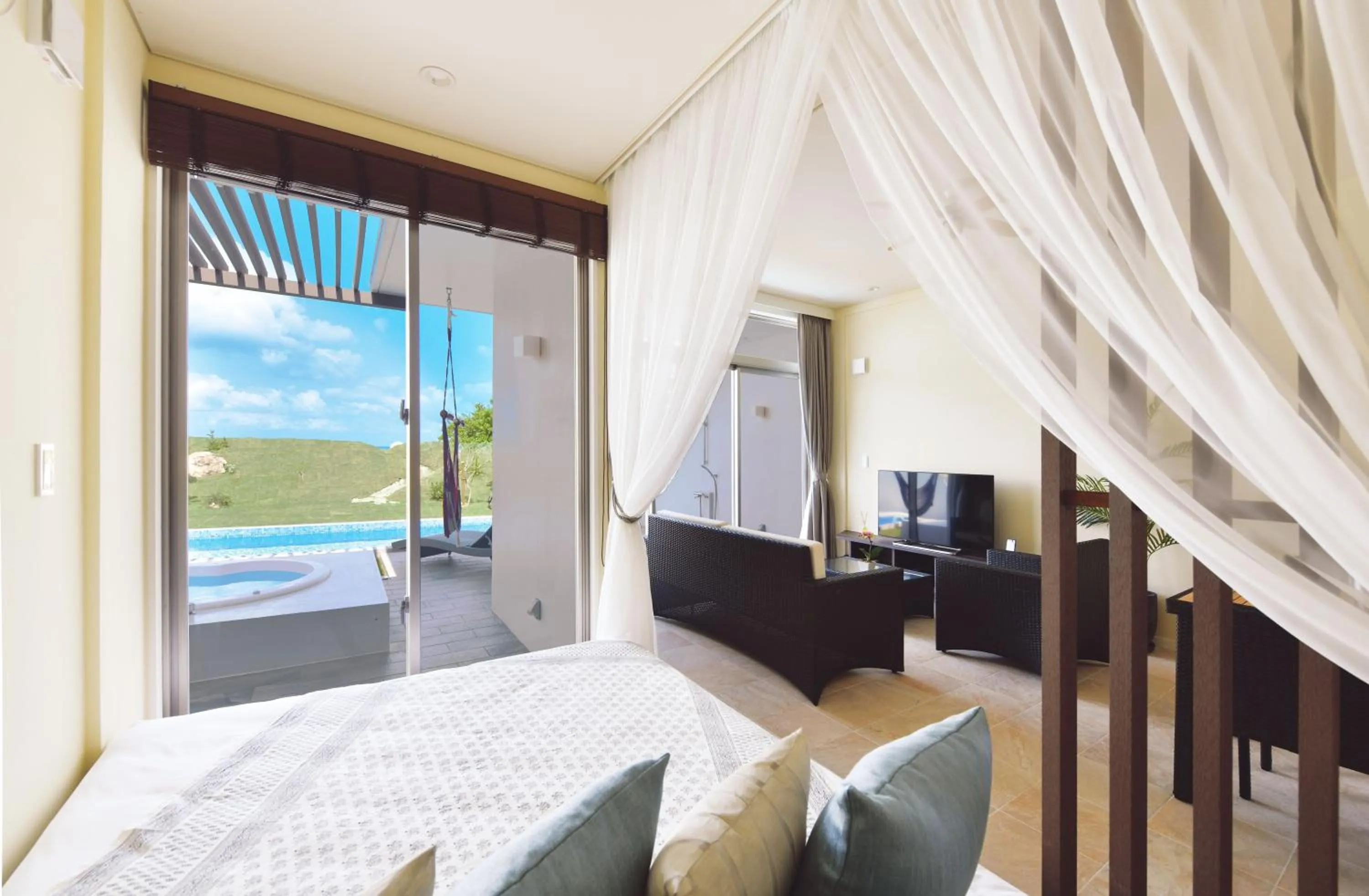 Bed in Feliz Villa Suite Irabujima Sawada