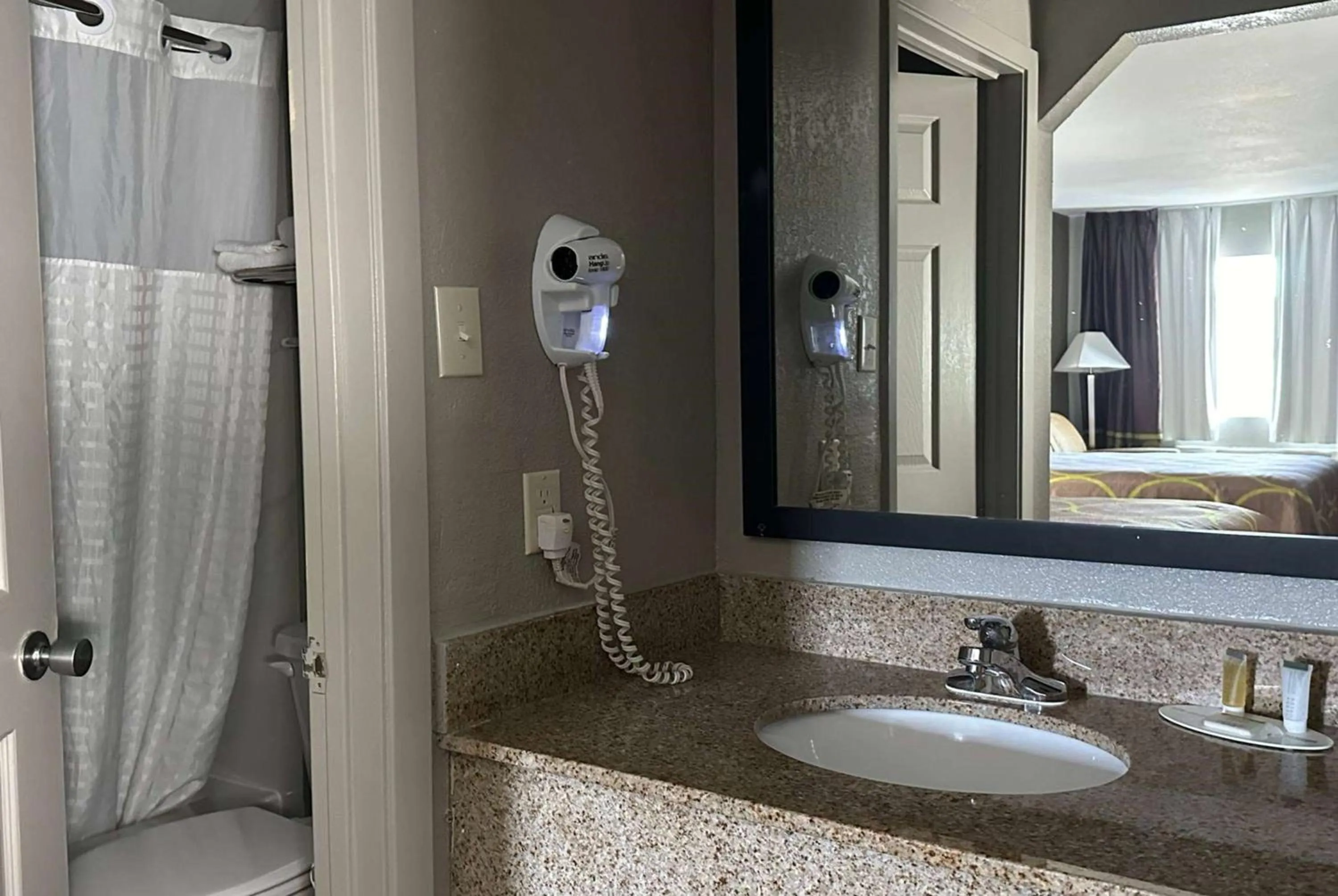 Bathroom in Super 8 by Wyndham Monroe