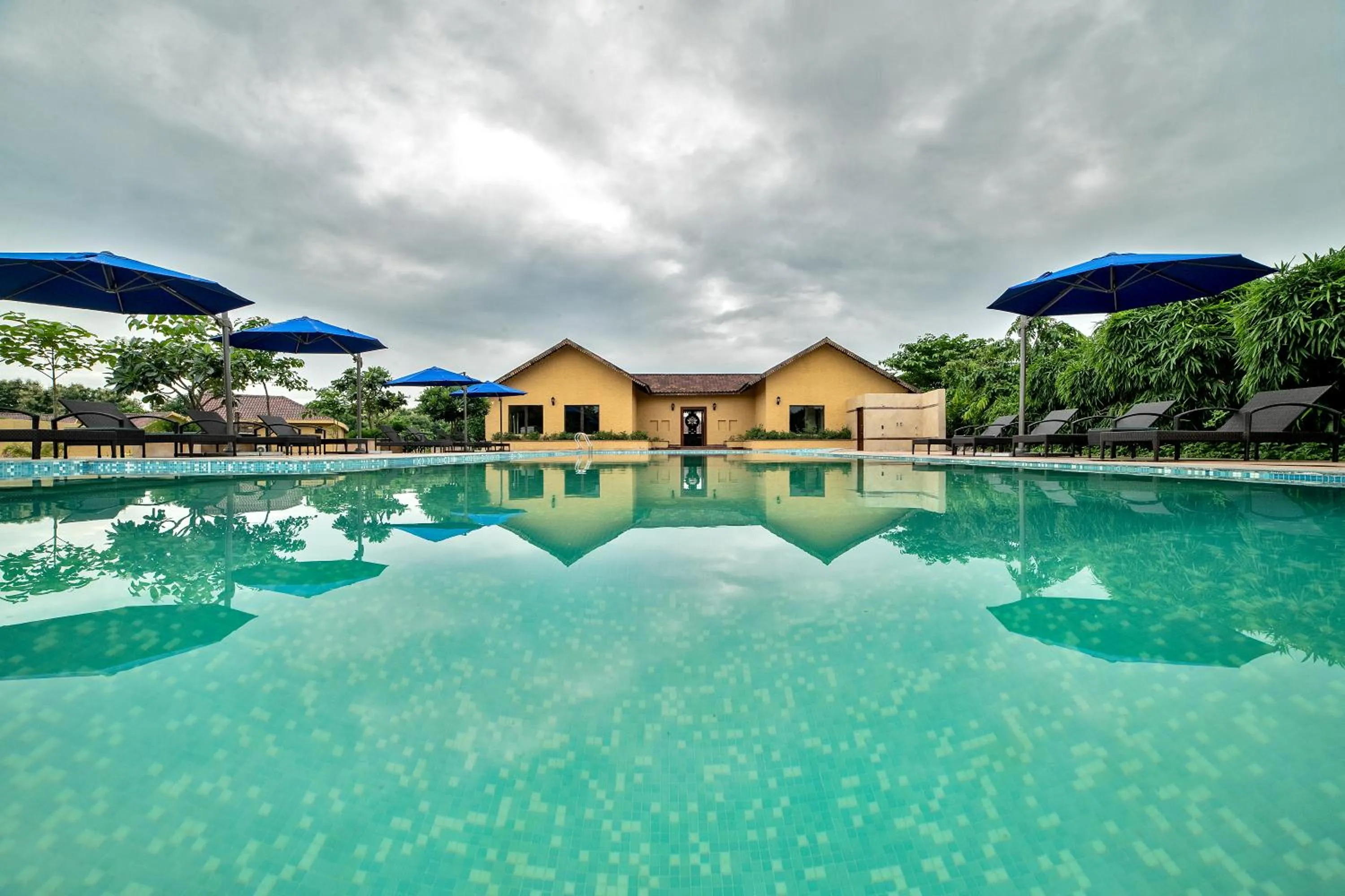 Swimming pool in WelcomHeritage Tadoba Vanya Villas Resort & Spa