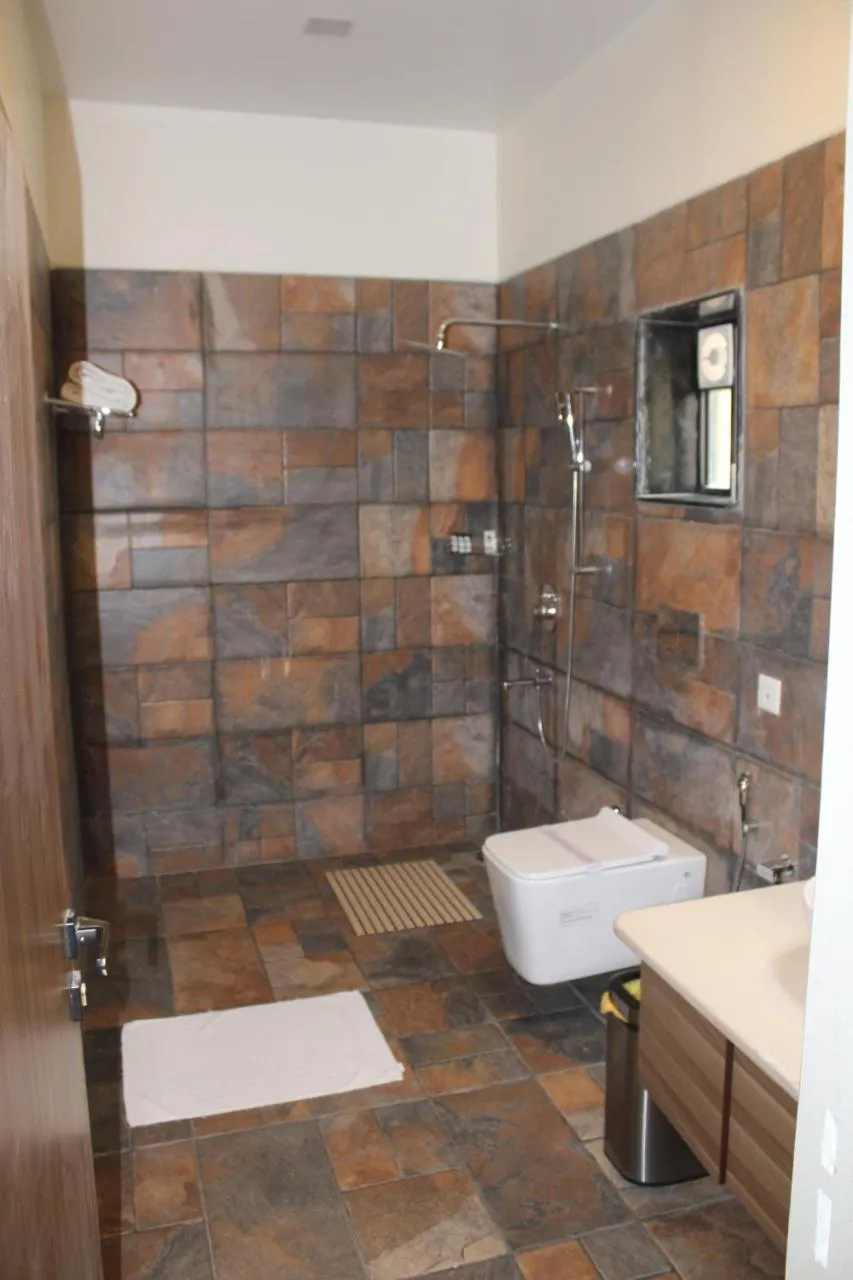 Toilet in WelcomHeritage Tadoba Vanya Villas Resort & Spa