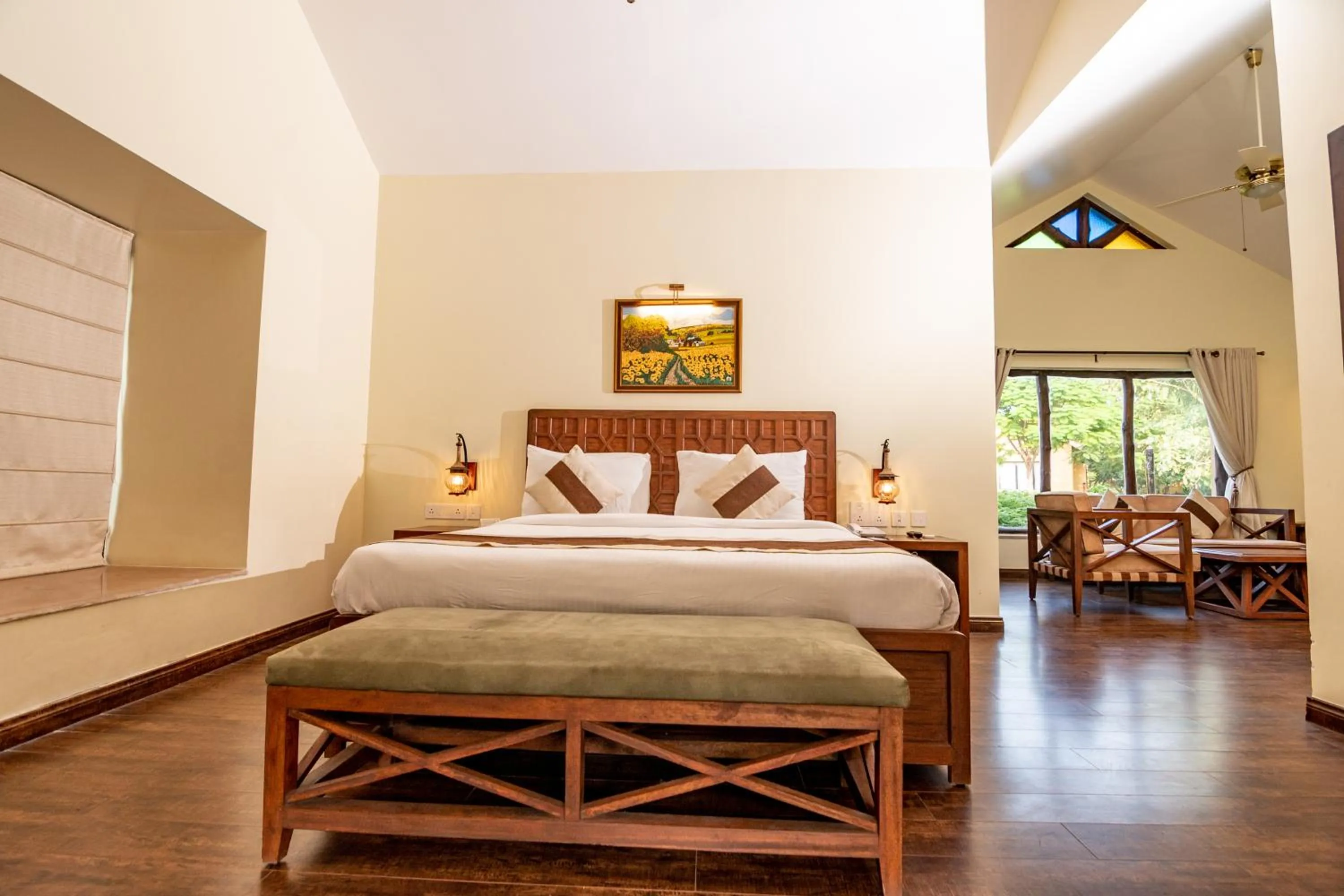 Bed in WelcomHeritage Tadoba Vanya Villas Resort & Spa