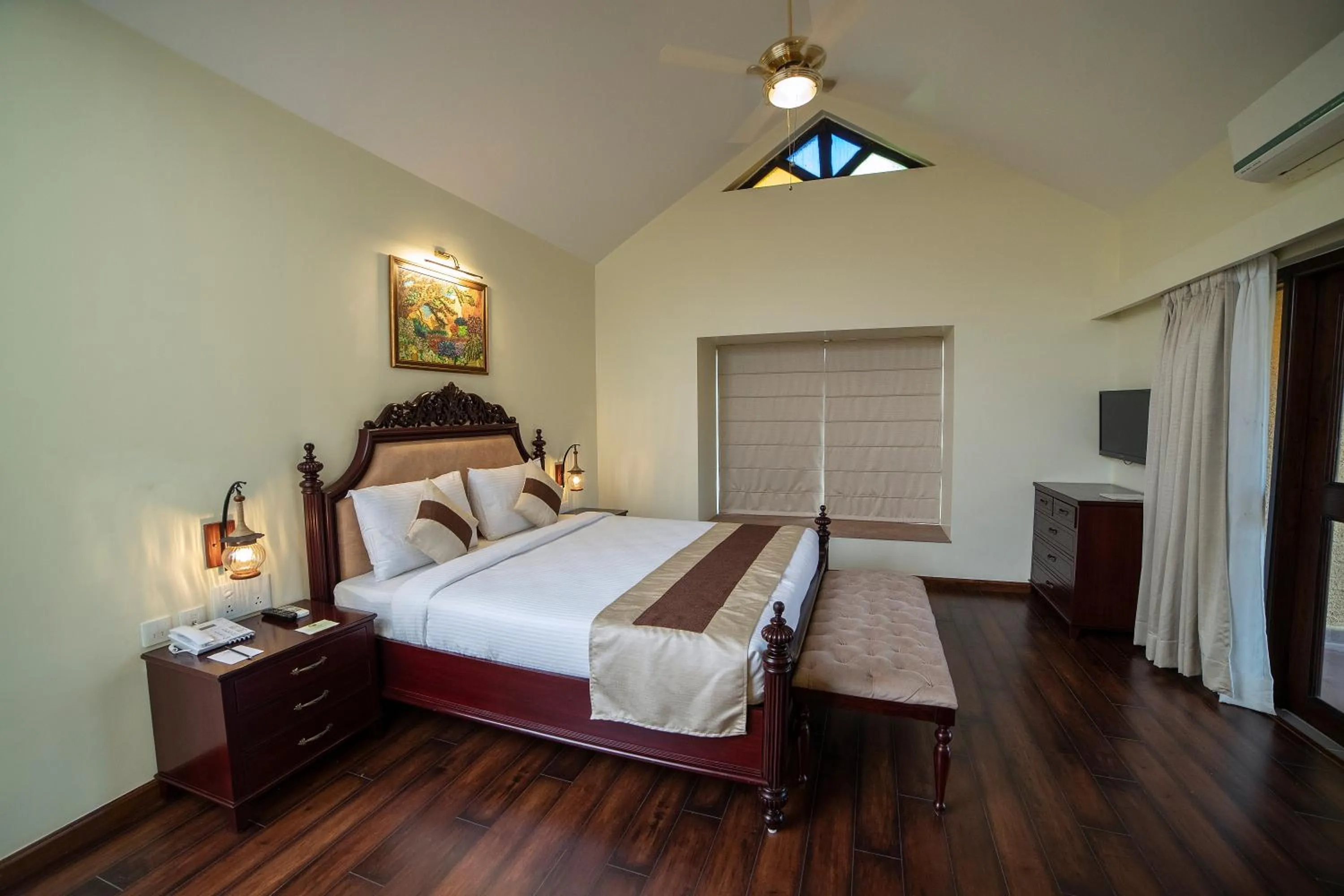 Bed in WelcomHeritage Tadoba Vanya Villas Resort & Spa