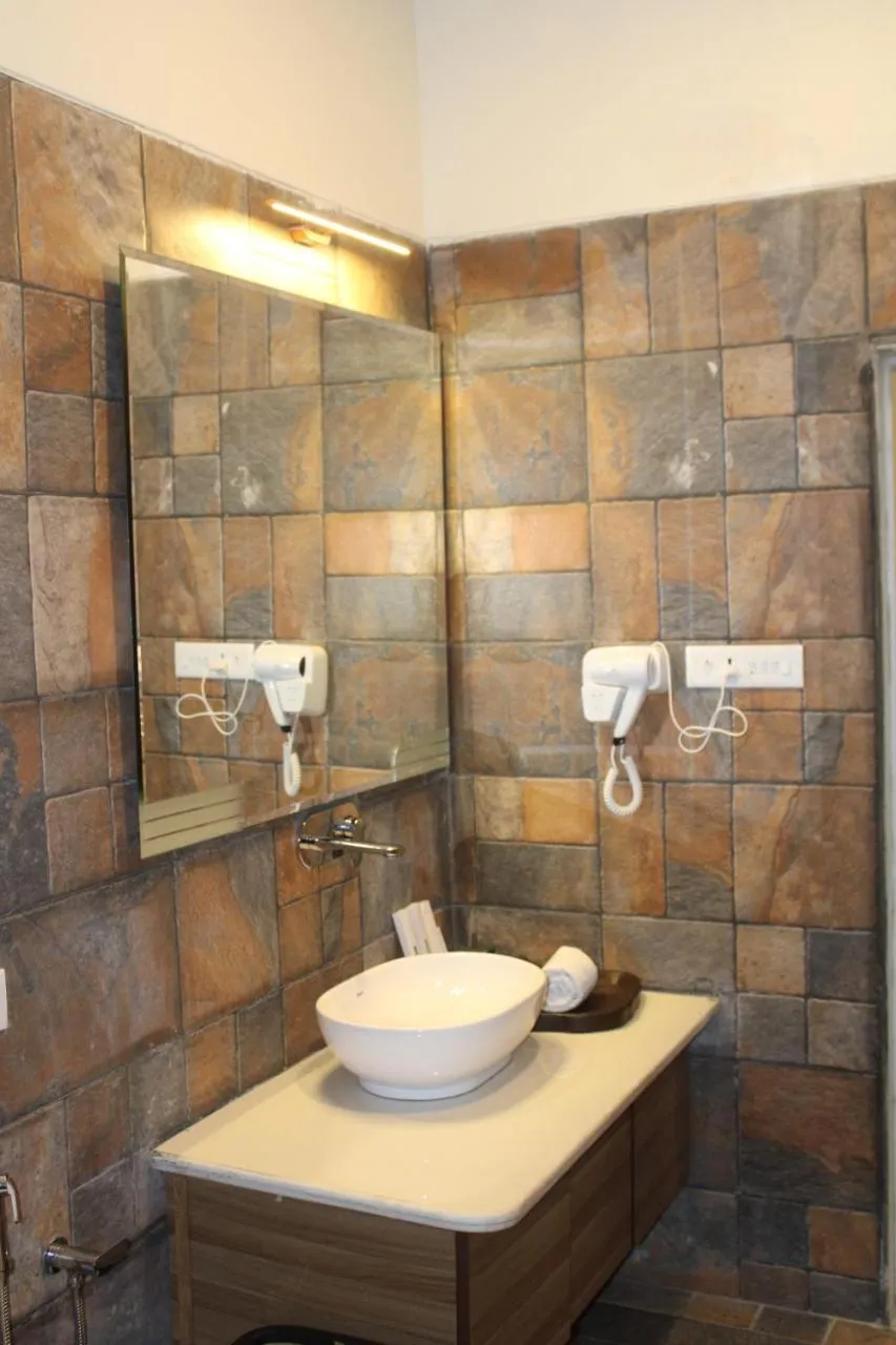 Bathroom in WelcomHeritage Tadoba Vanya Villas Resort & Spa