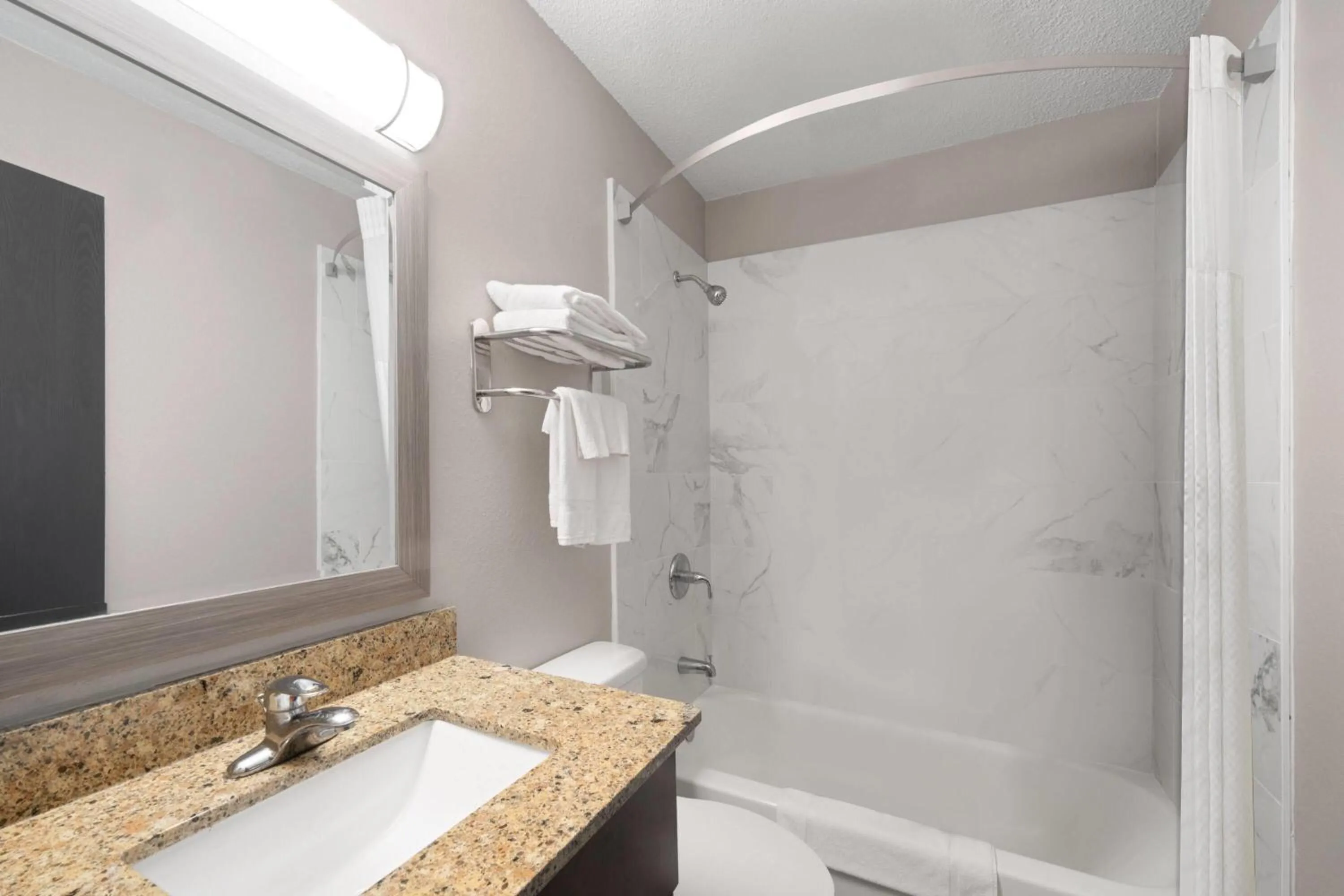 Bathroom in Super 8 by Wyndham Farmville