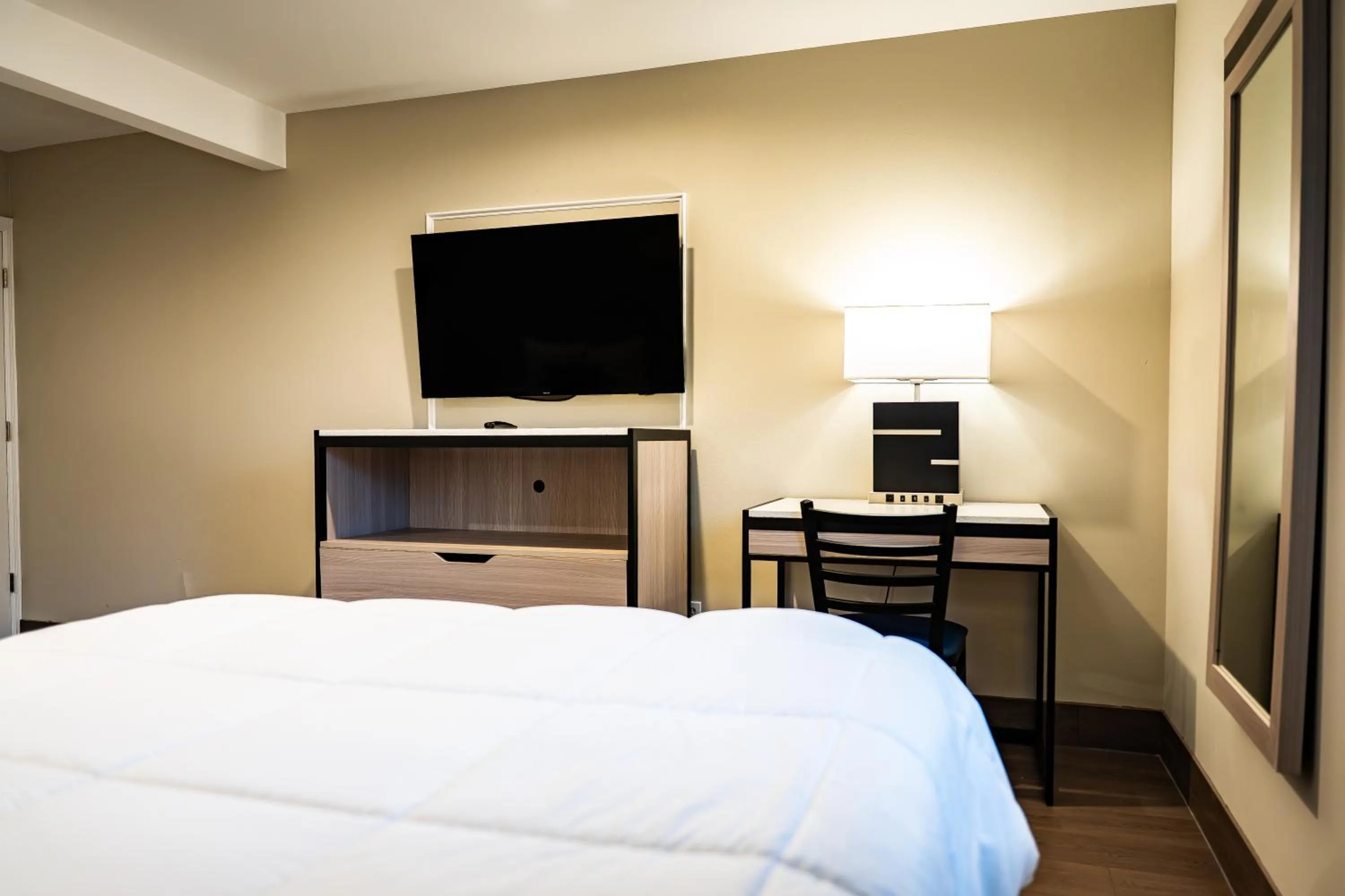 Bed in Whitman Motor Lodge