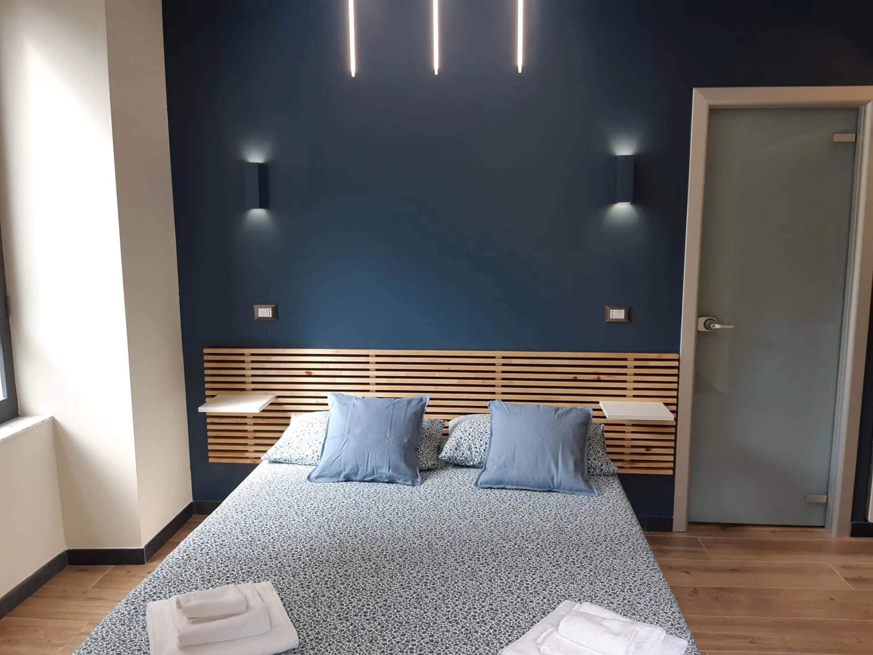 Bed in Il Giardino di Elettra - FreeParking