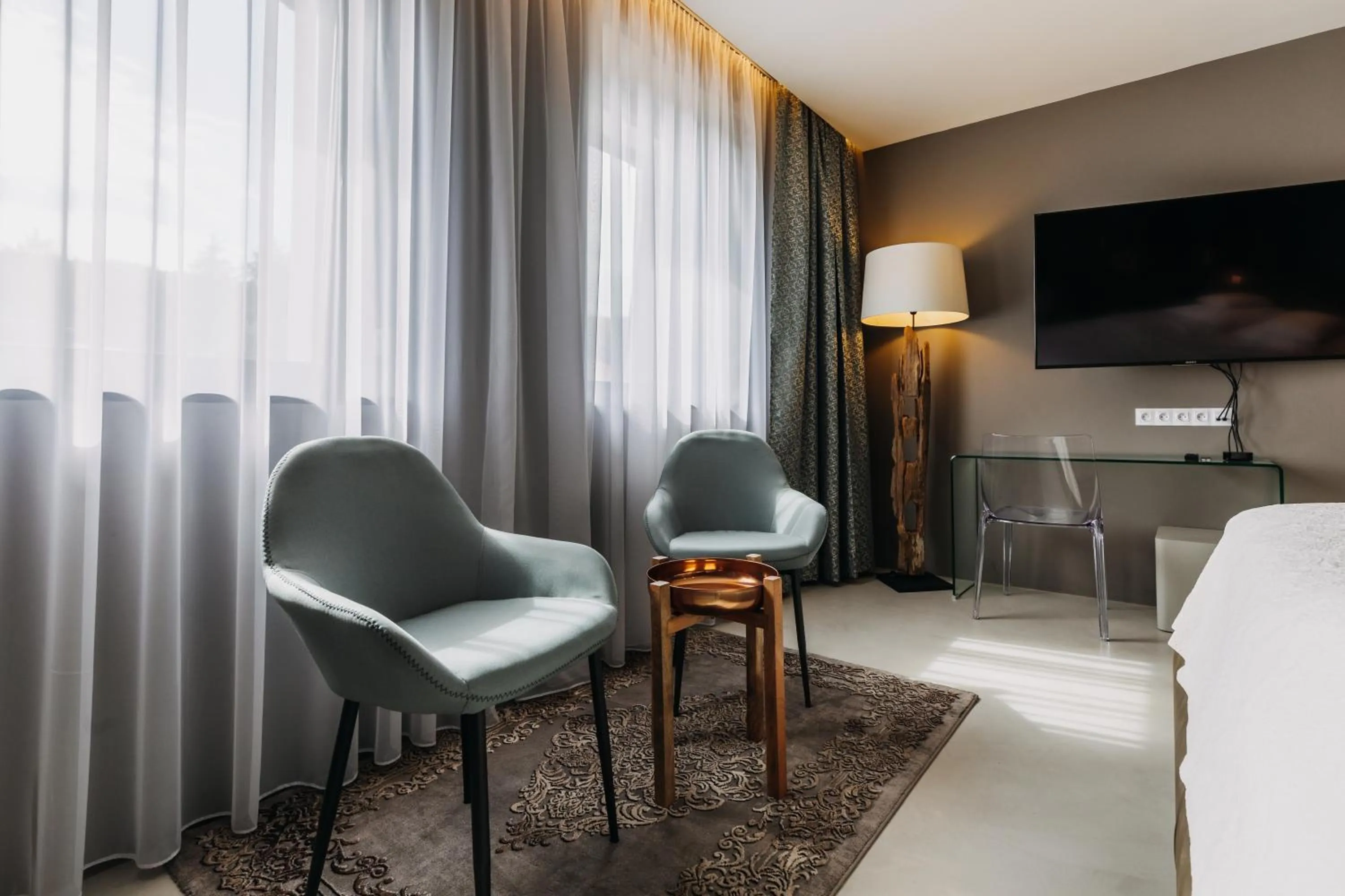 Seating area in VILLA BRICOLA - Boutique Apartments