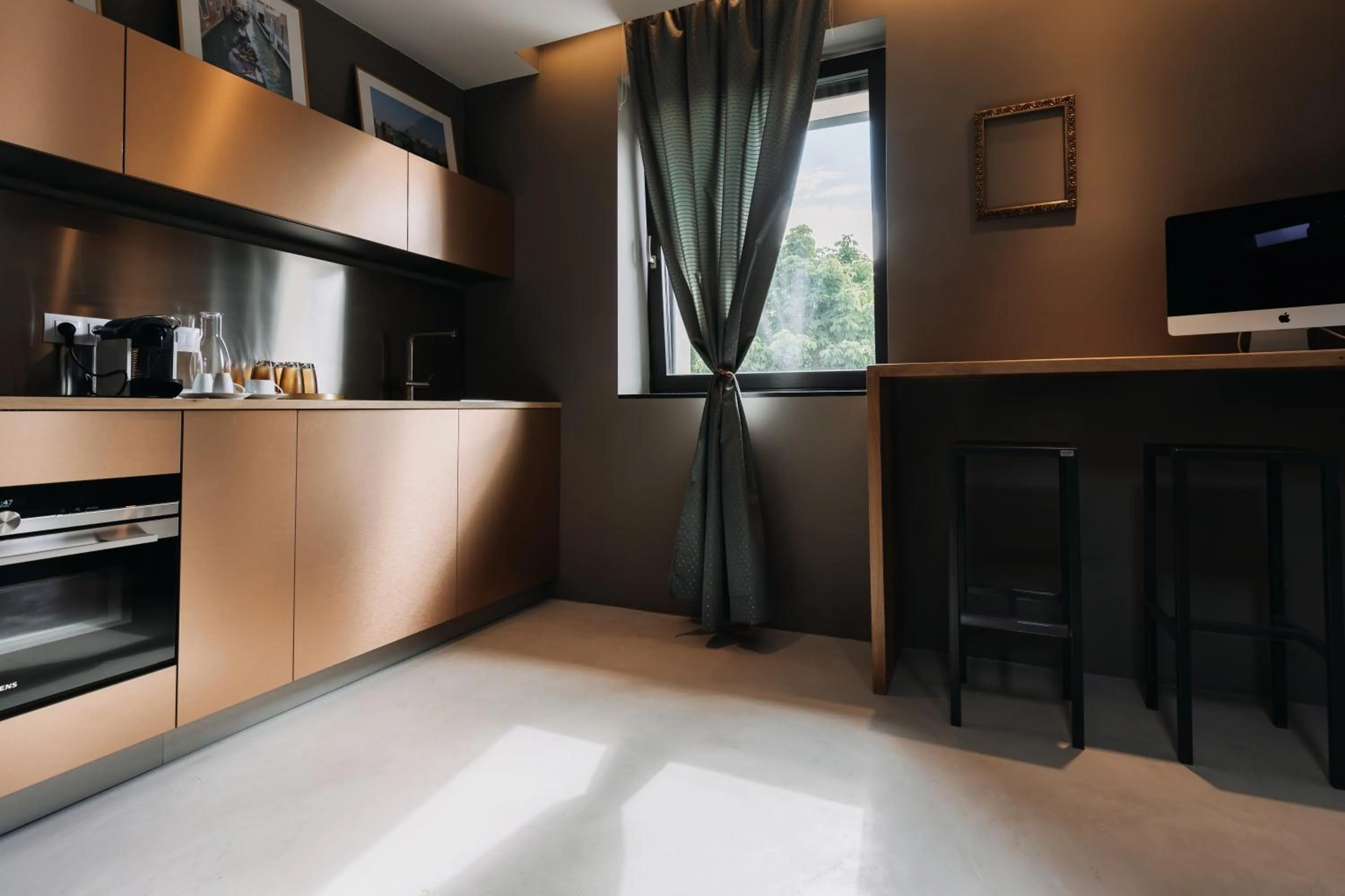 TV and multimedia in VILLA BRICOLA - Boutique Apartments