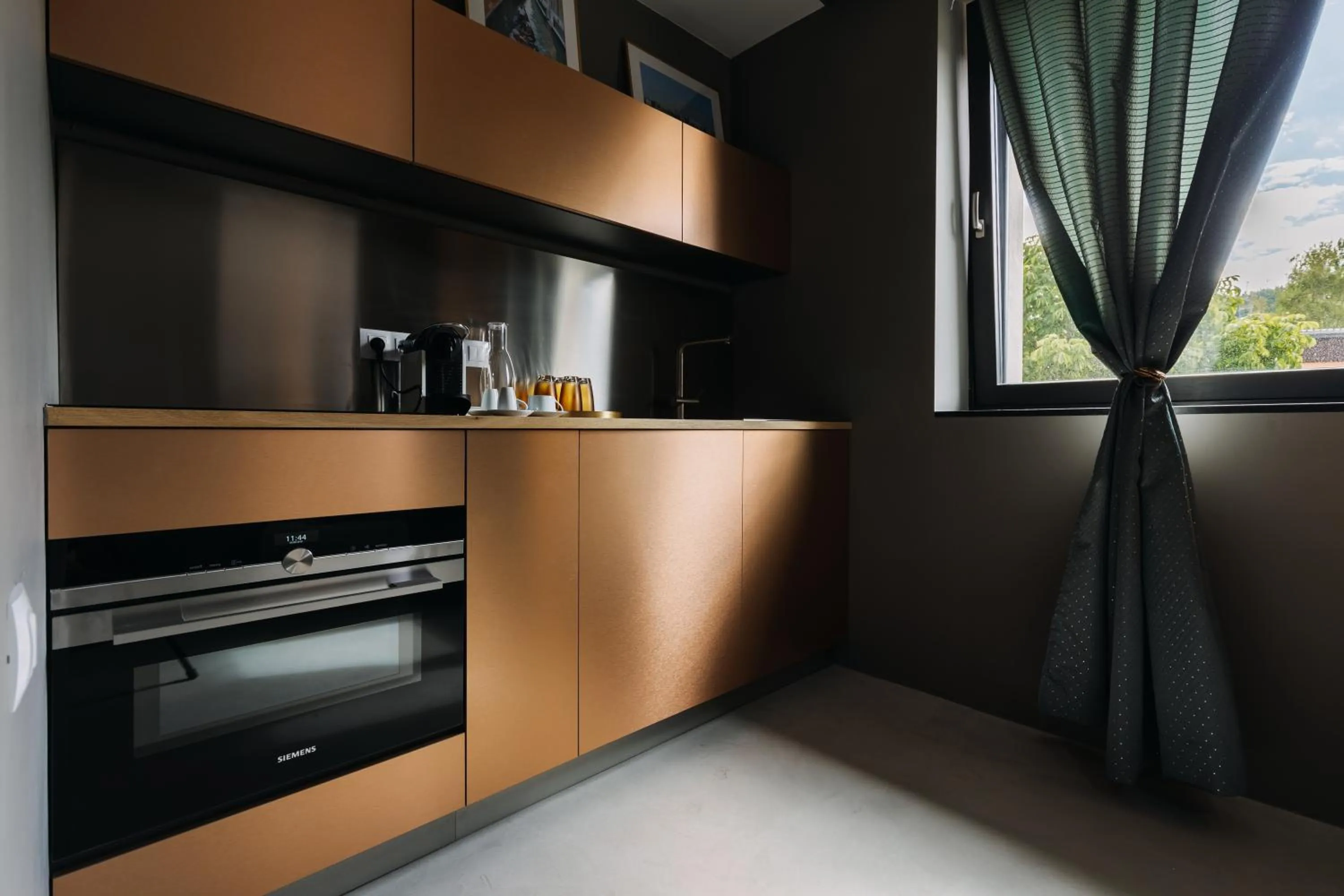 Kitchen or kitchenette in VILLA BRICOLA - Boutique Apartments