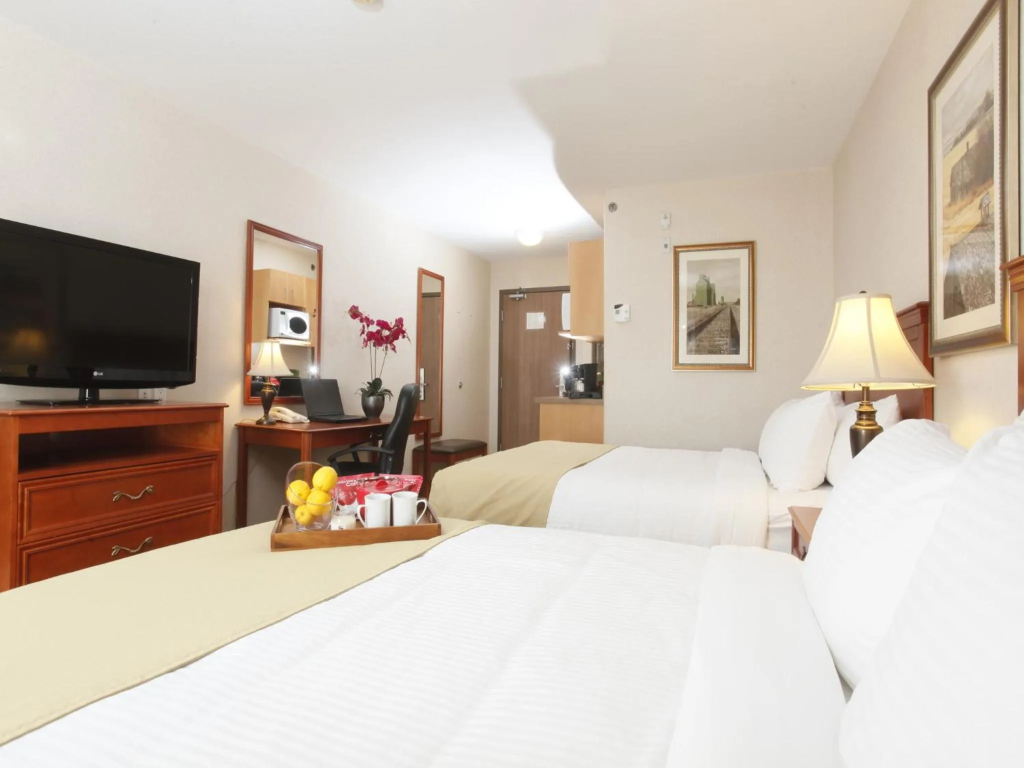 Photo of the whole room, Bed in Stonebridge Hotel Dawson Creek