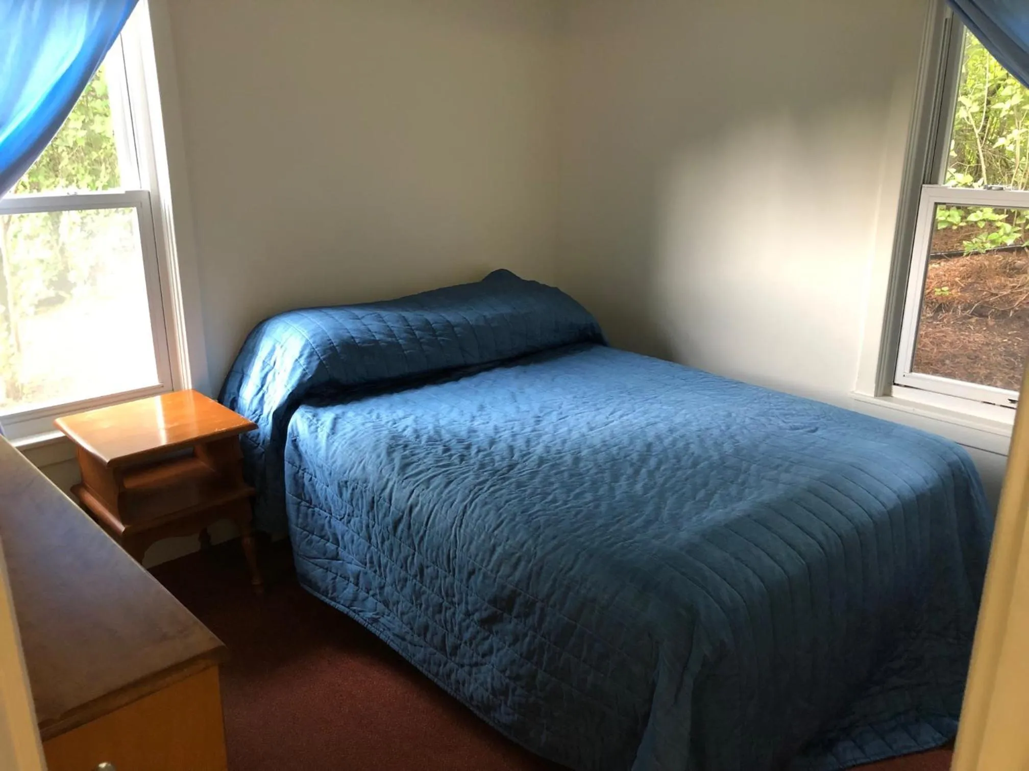 Bedroom, Bed in West Winds Motel & Cottages