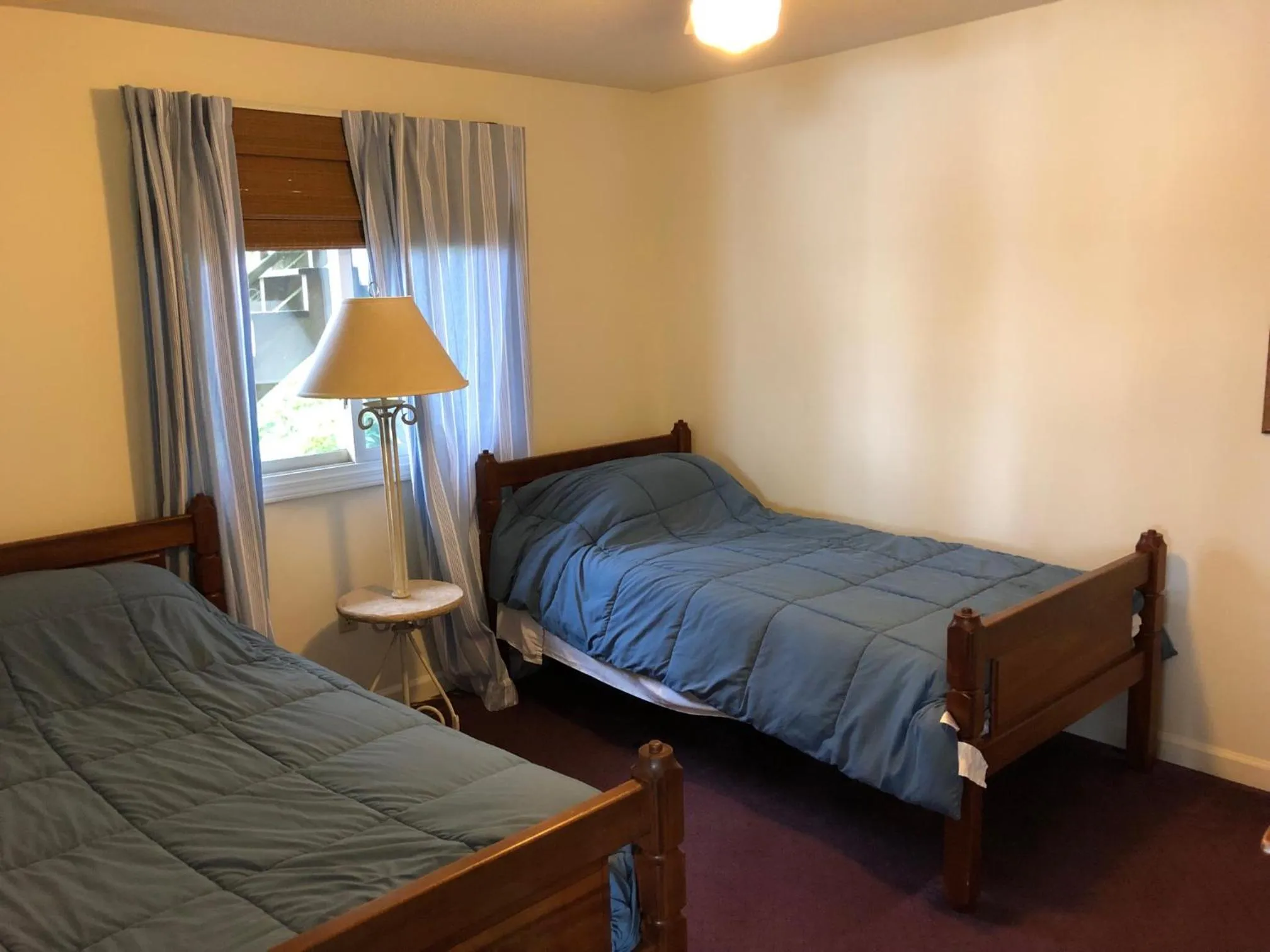 Bedroom, Bed in West Winds Motel & Cottages
