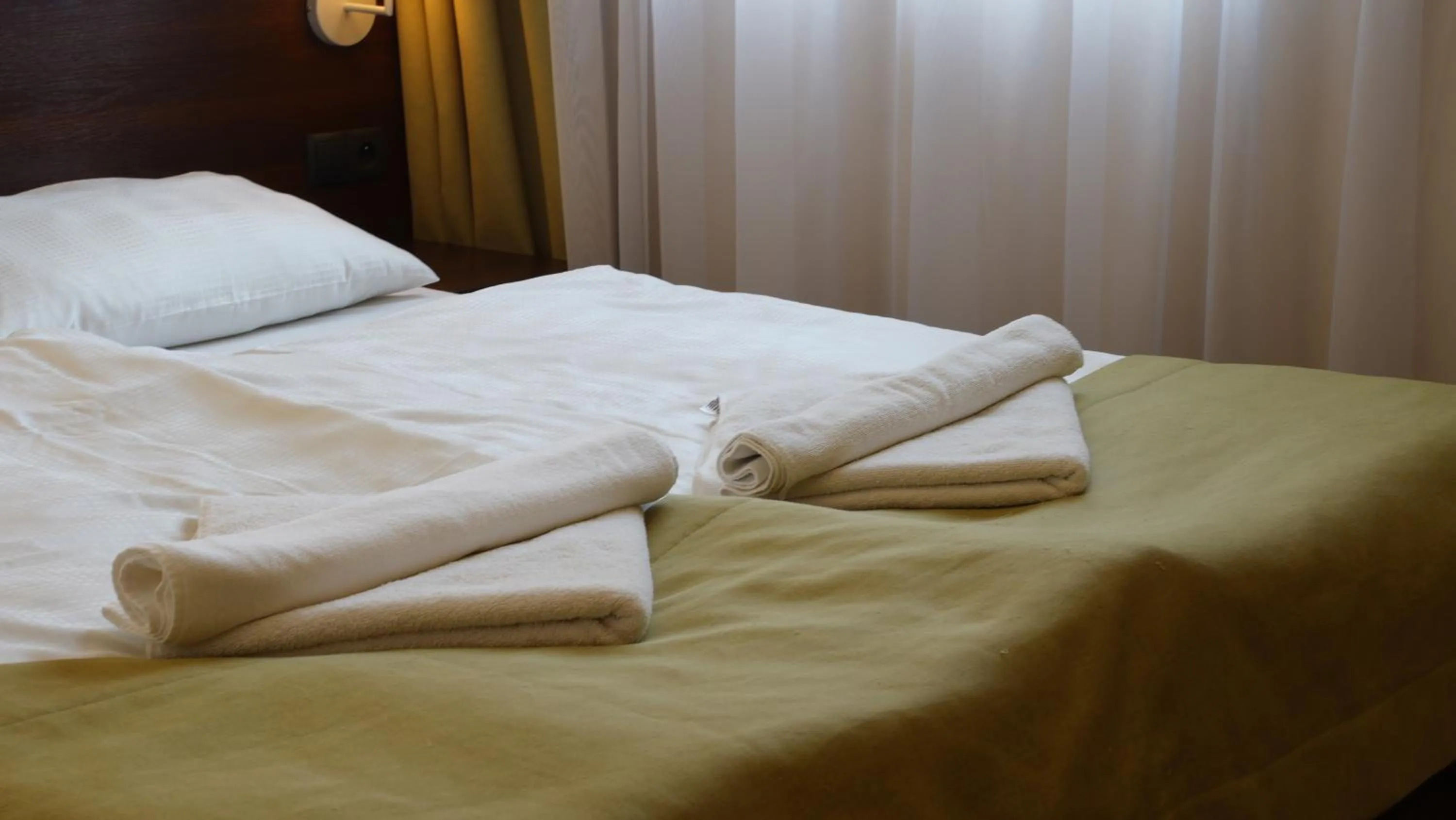 Bed in Aparthotel Lumen