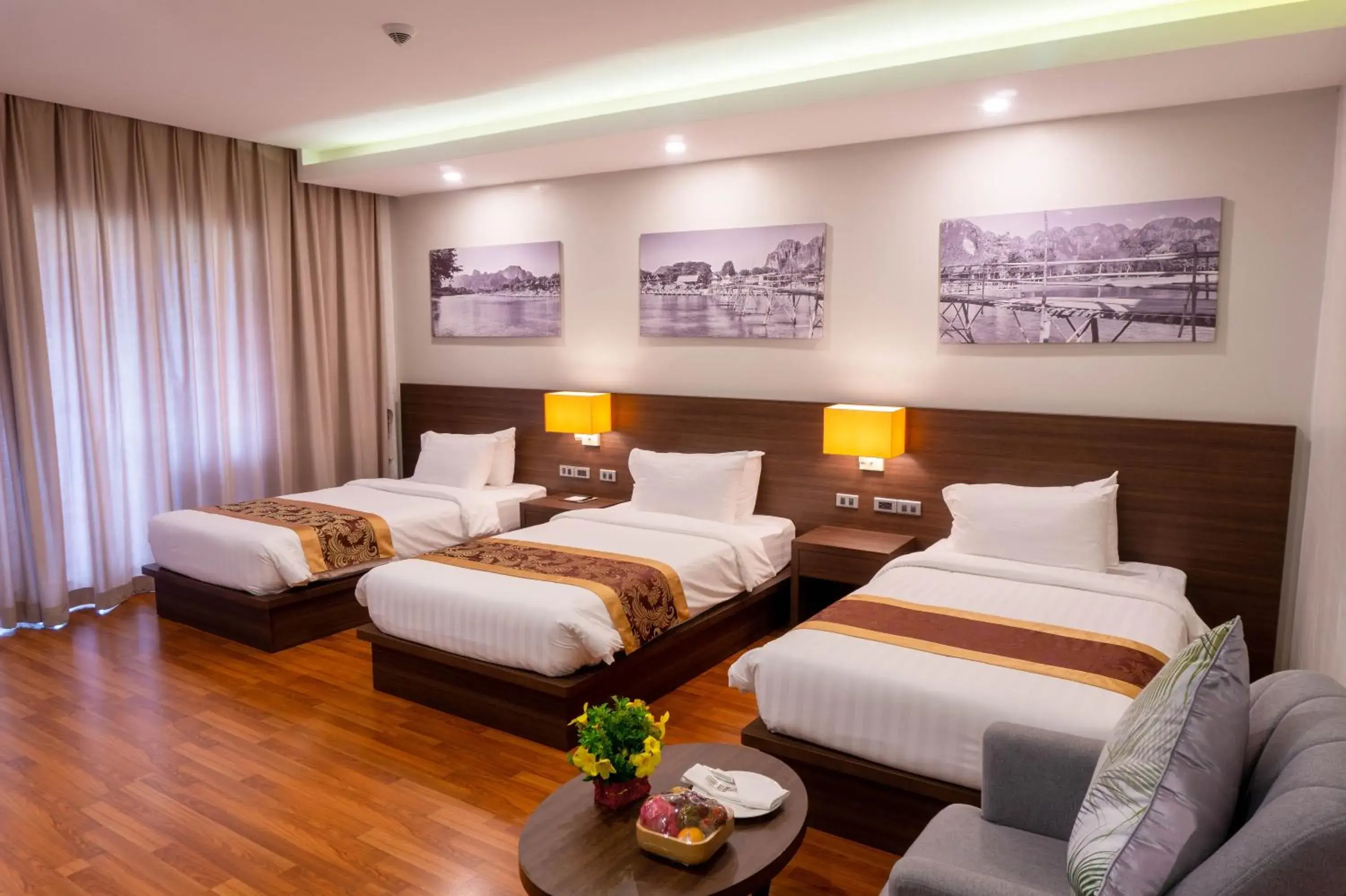 Triple Room in Tmark Resort Vangvieng Triple Room in Tmark Resort Vangvieng