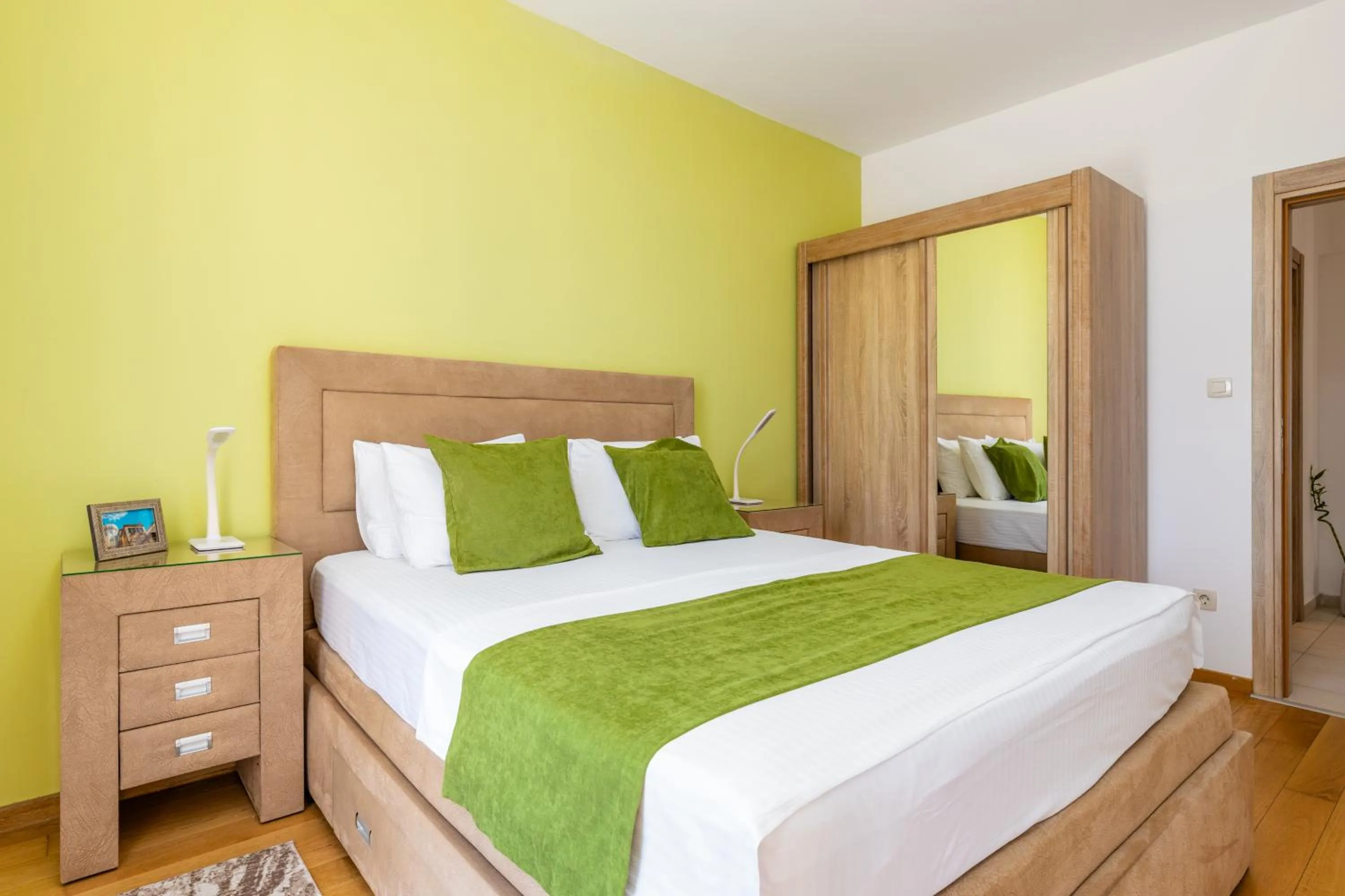 Decorative detail, Bed in Apart hotel M S KATUNJANIN