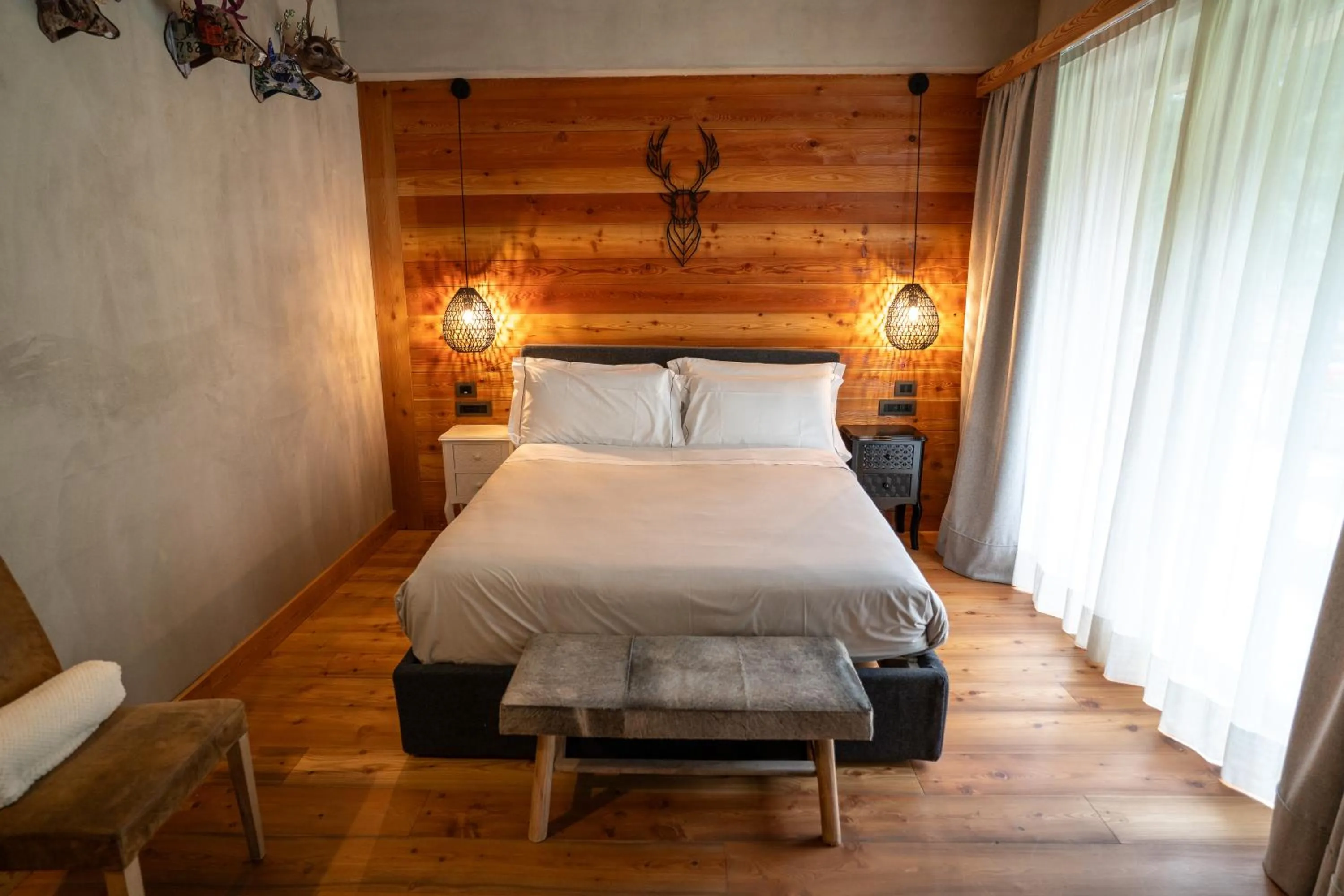 Bed in Au Charmant Petit Lac - Ecohotel Parc & Spa