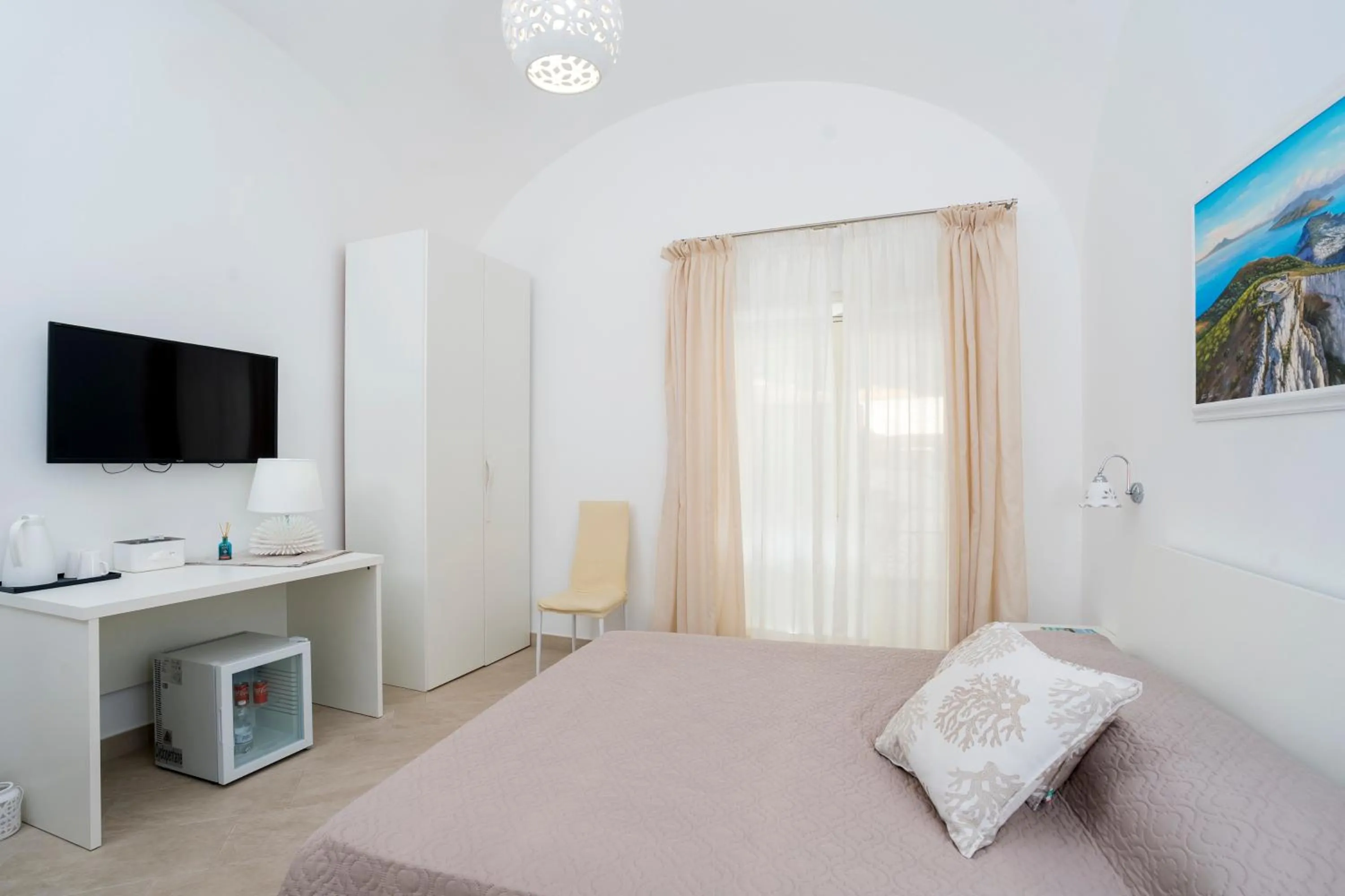 Bed in Caprita Guest House