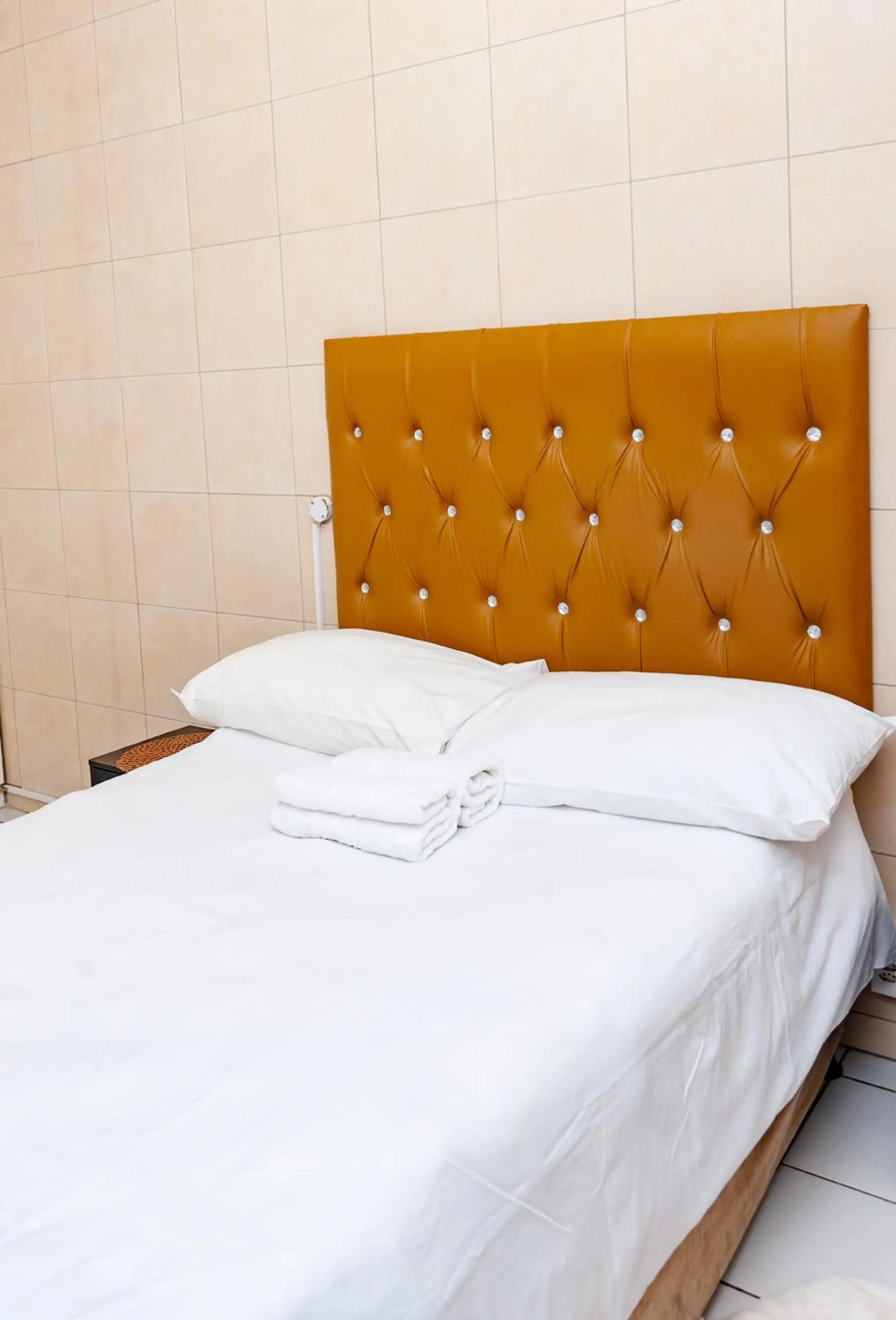 Bed in Nkosazana Guest House