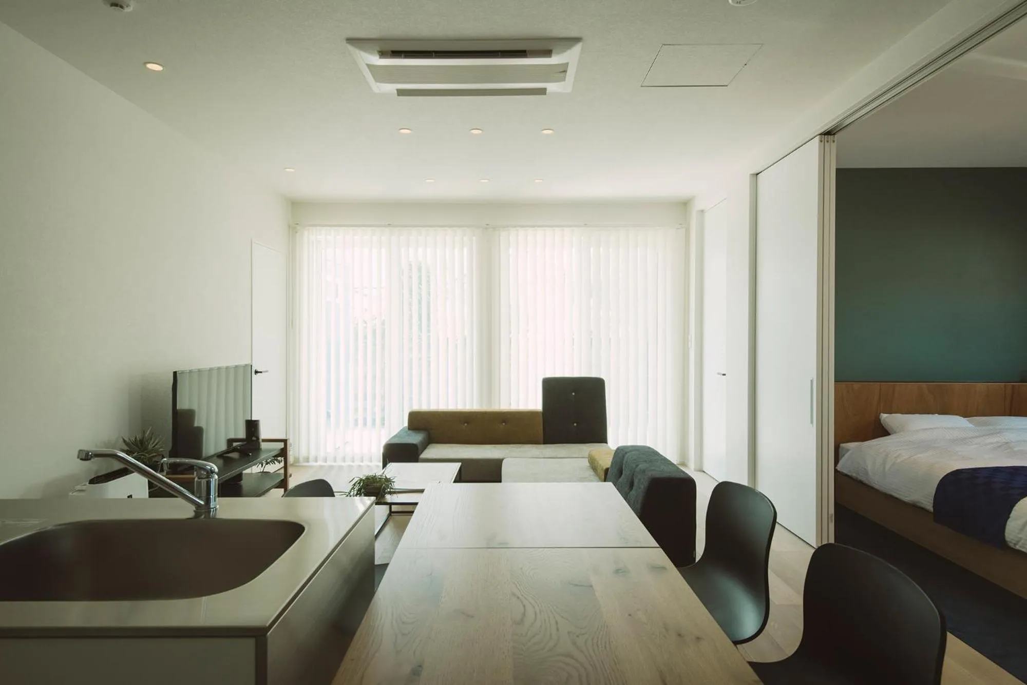 Dining area, Bed in Seacruise House Navio
