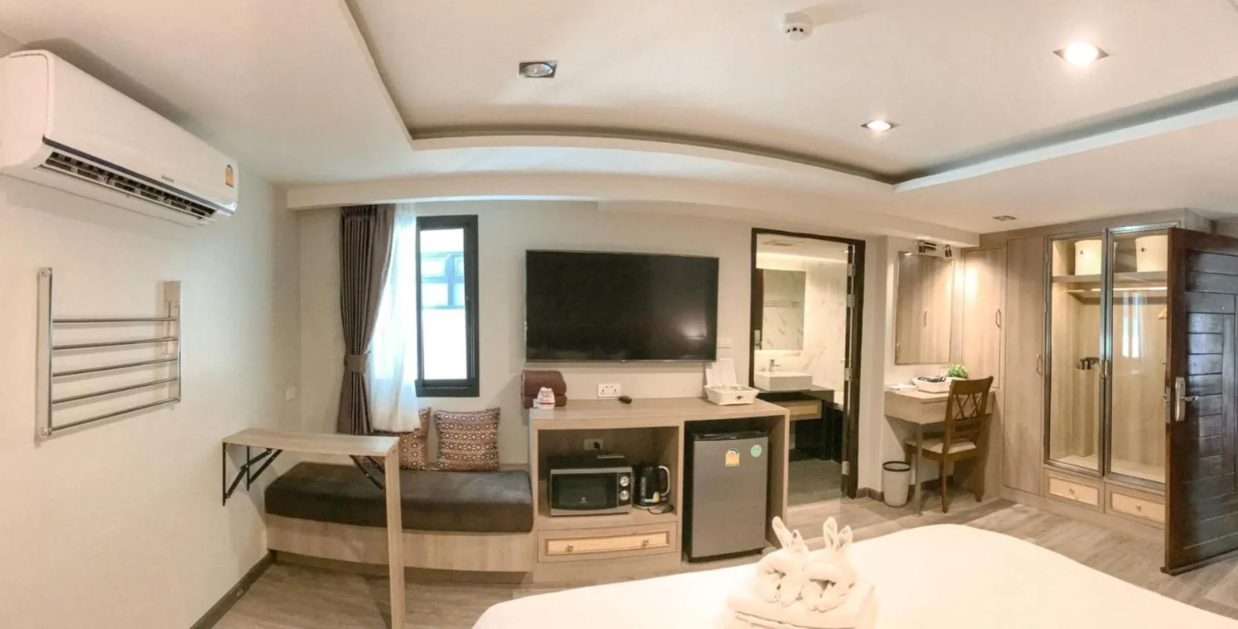 Bed in Hotel De Sripoom