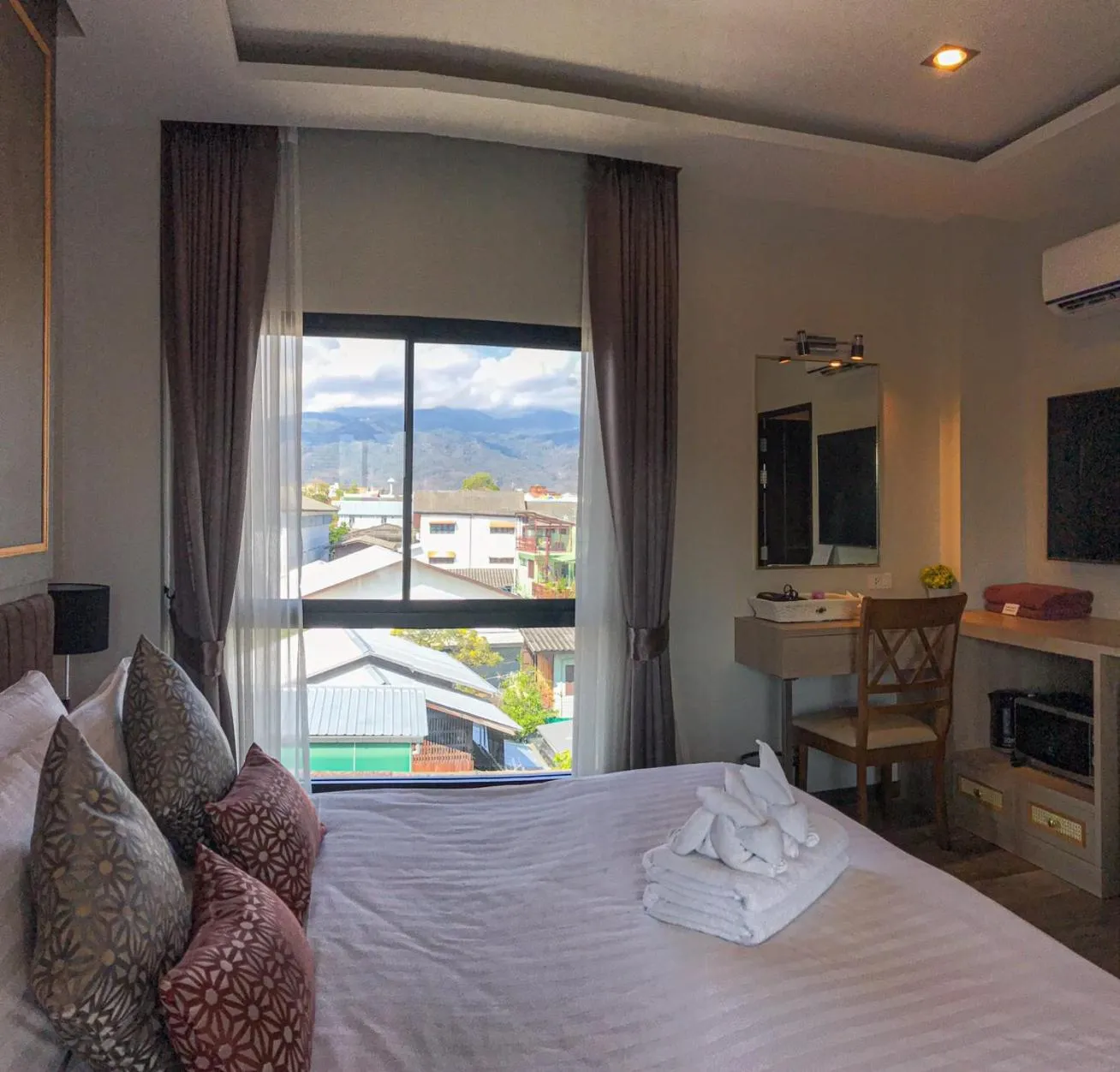 Bed in Hotel De Sripoom