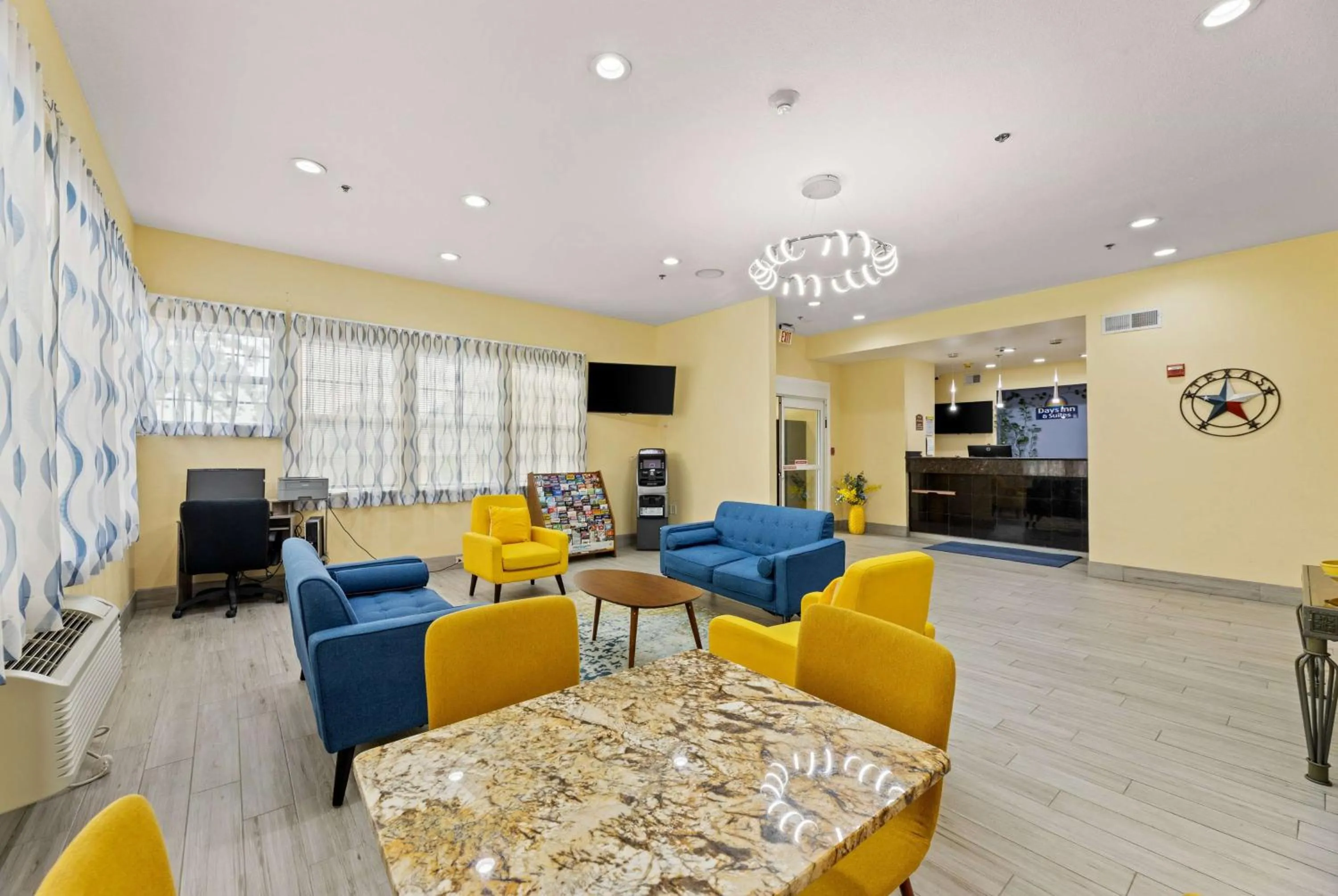 Lobby or reception in Days Inn & Suites by Wyndham DFW Airport South-Euless