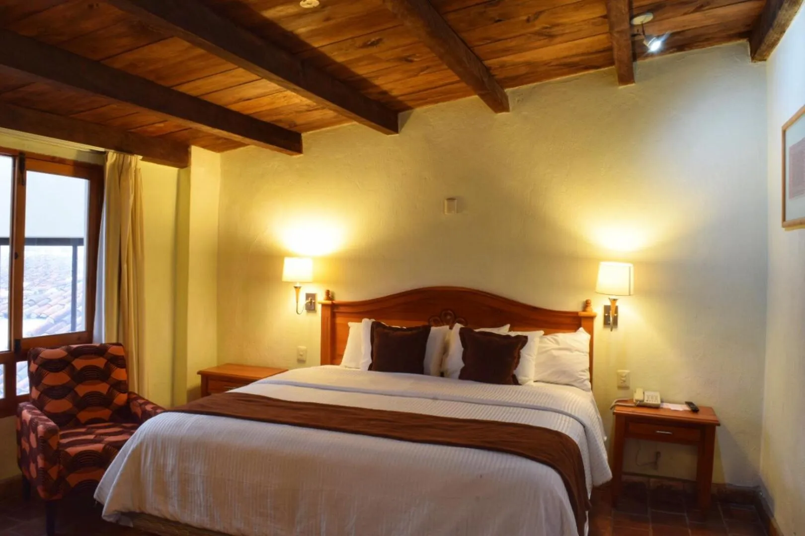 Bed in Plaza Magnolias Suites