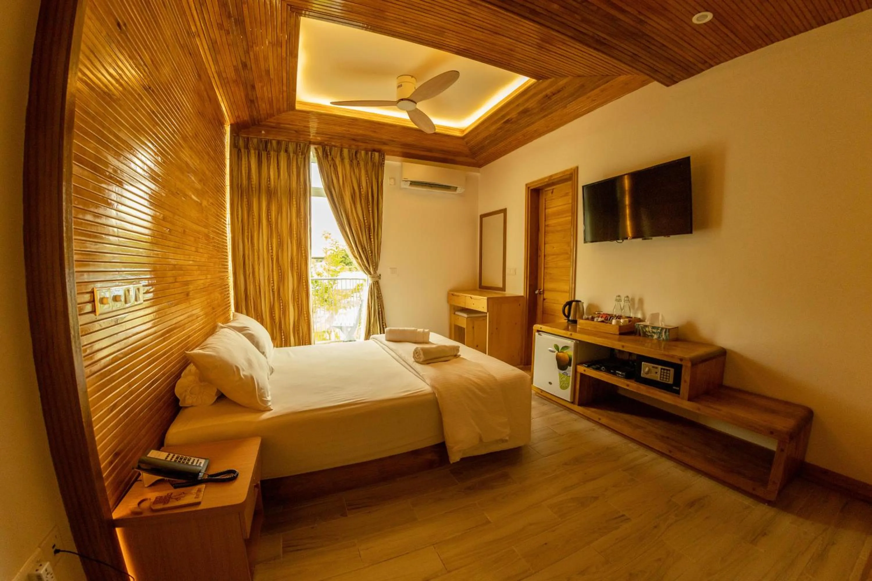 Photo of the whole room, Bed in PERLA Dhangethi