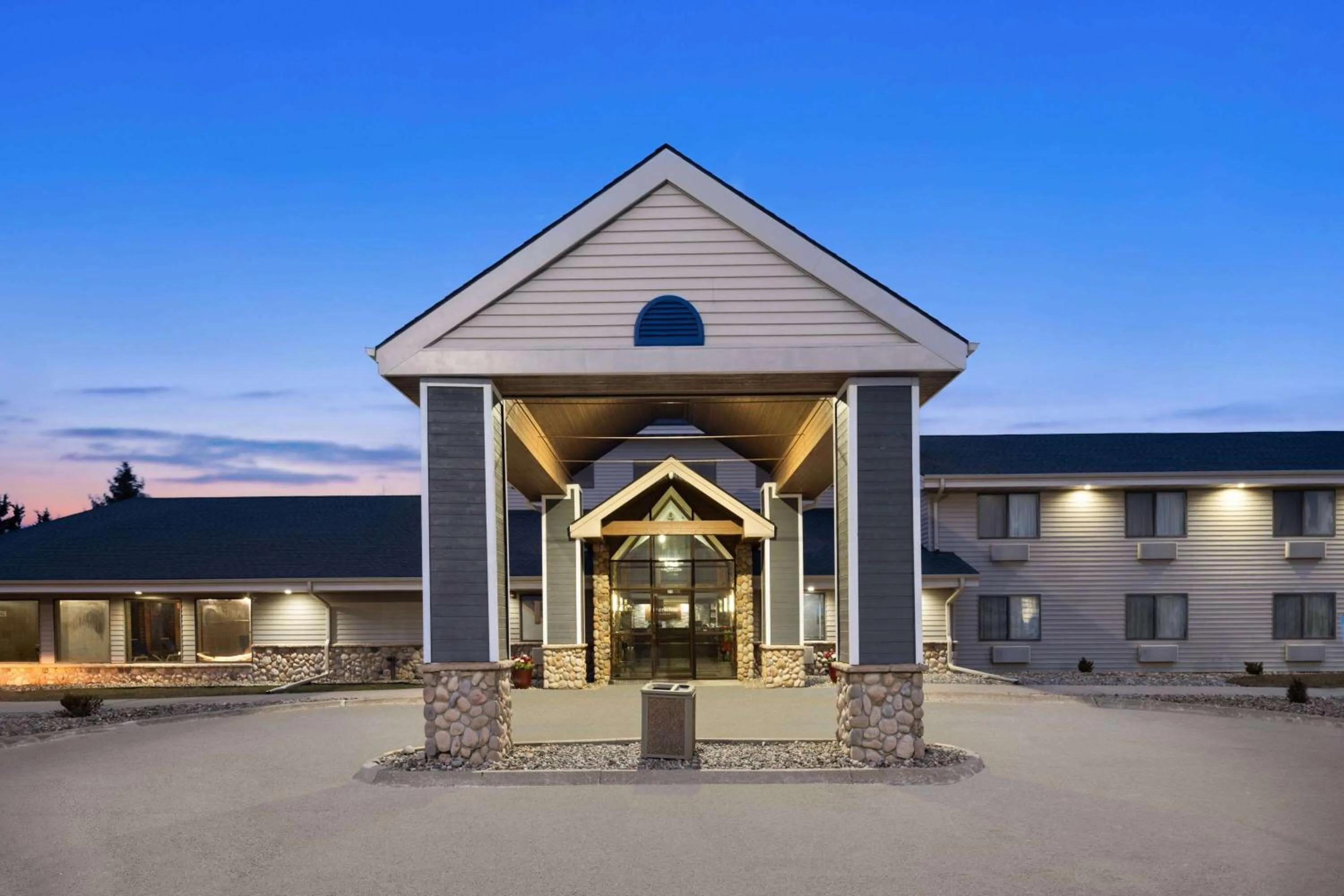 Property building in AmericInn by Wyndham Stuart