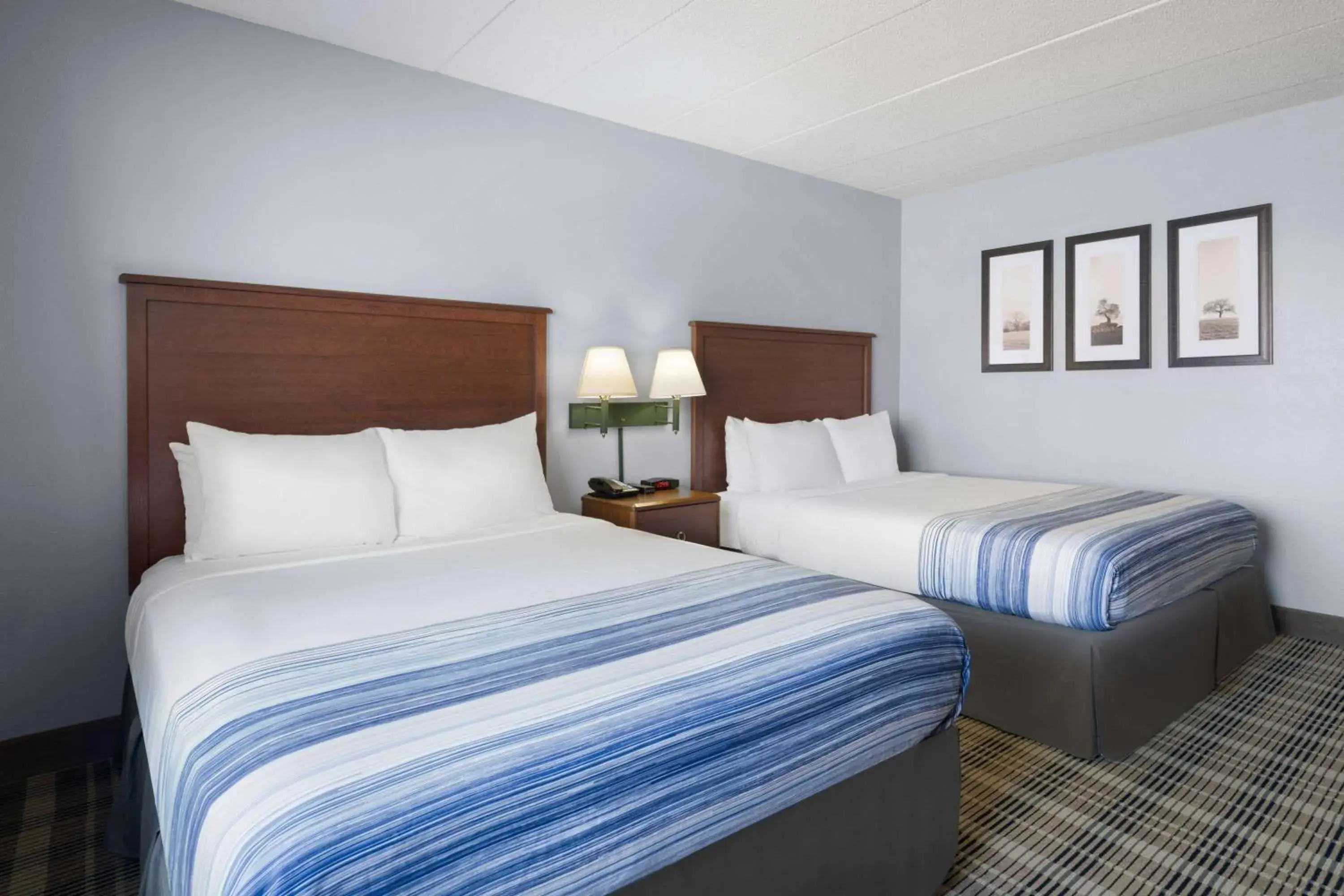 Deluxe Queen Room - Mobility Access/Non-Smoking in AmericInn by Wyndham Stuart Deluxe Queen Room - Mobility Access/Non-Smoking in AmericInn by Wyndham Stuart