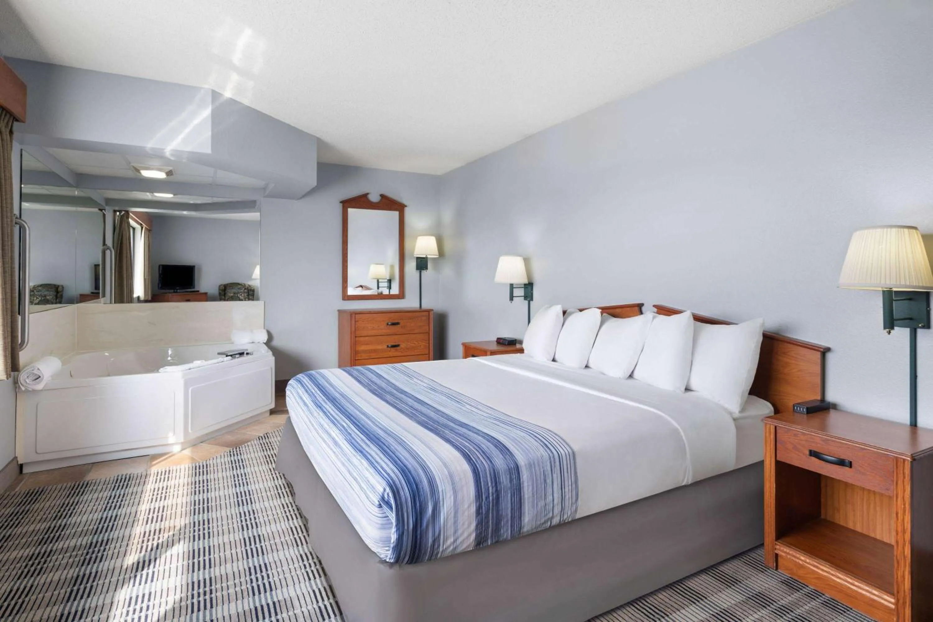 Photo of the whole room, Bed in AmericInn by Wyndham Stuart