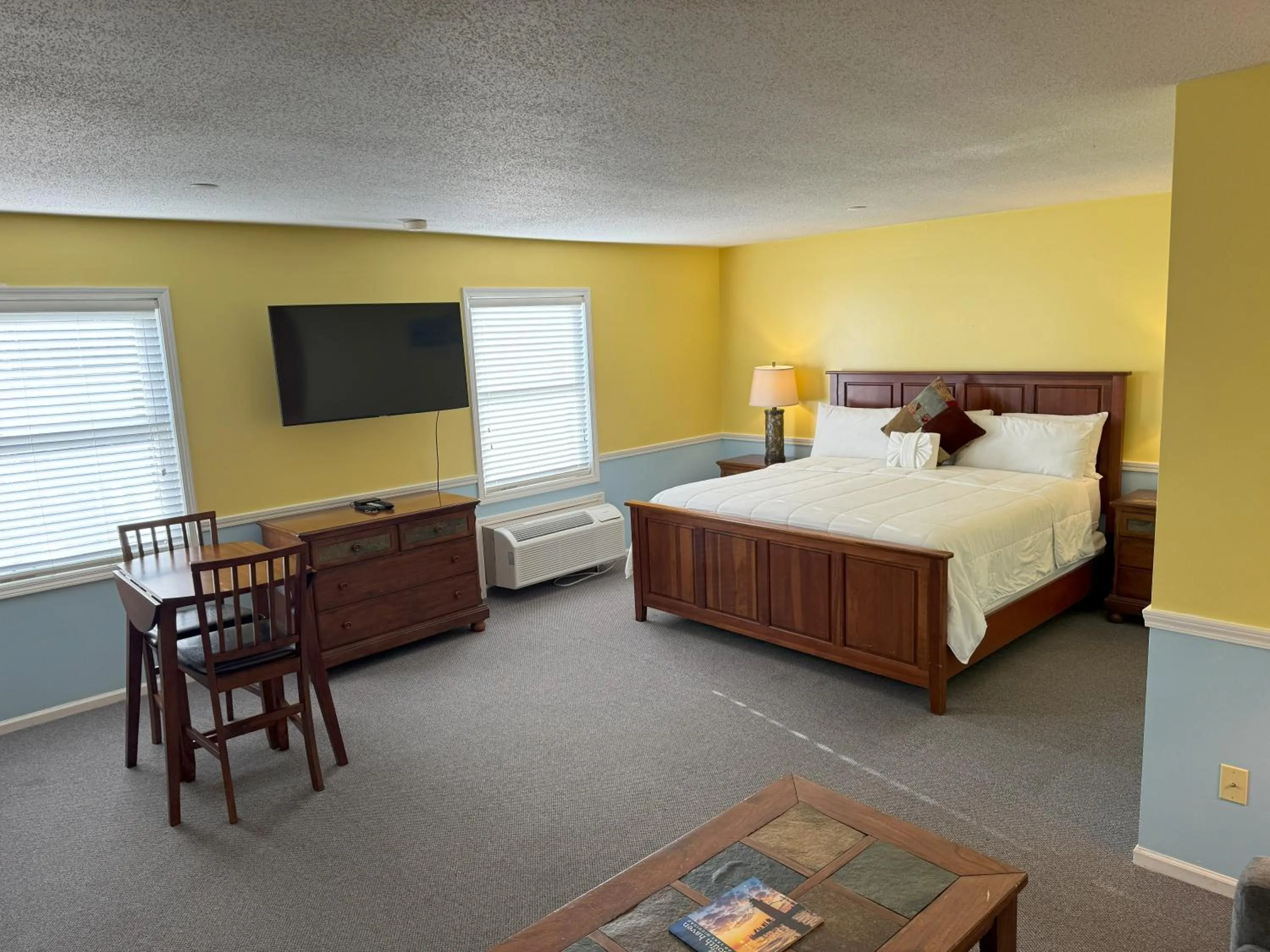 Bed in Old Harbor Inn