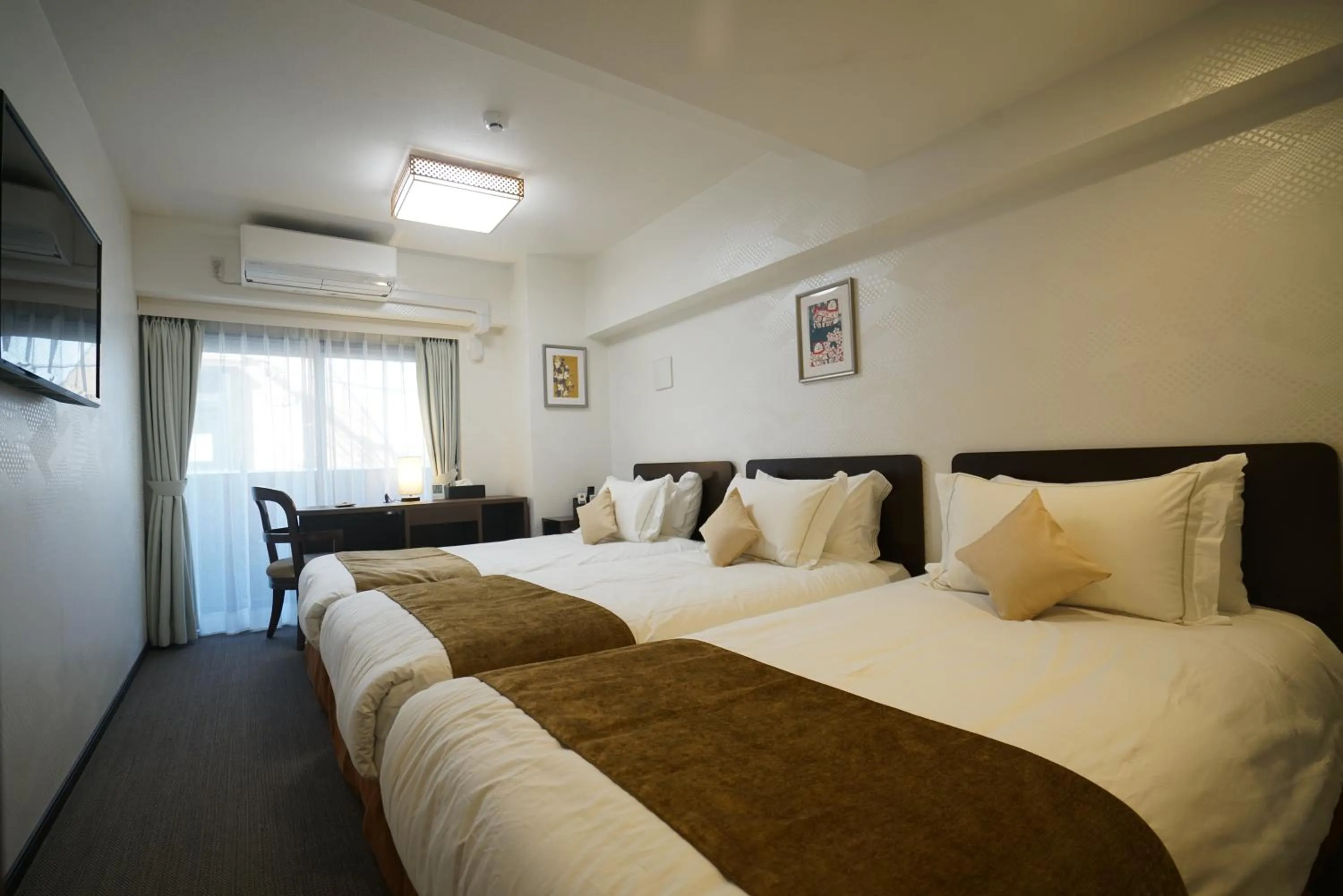 Photo of the whole room, Bed in Le Tour Hotel Akihabara Ekimae 楽途ホテル秋葉原駅前店