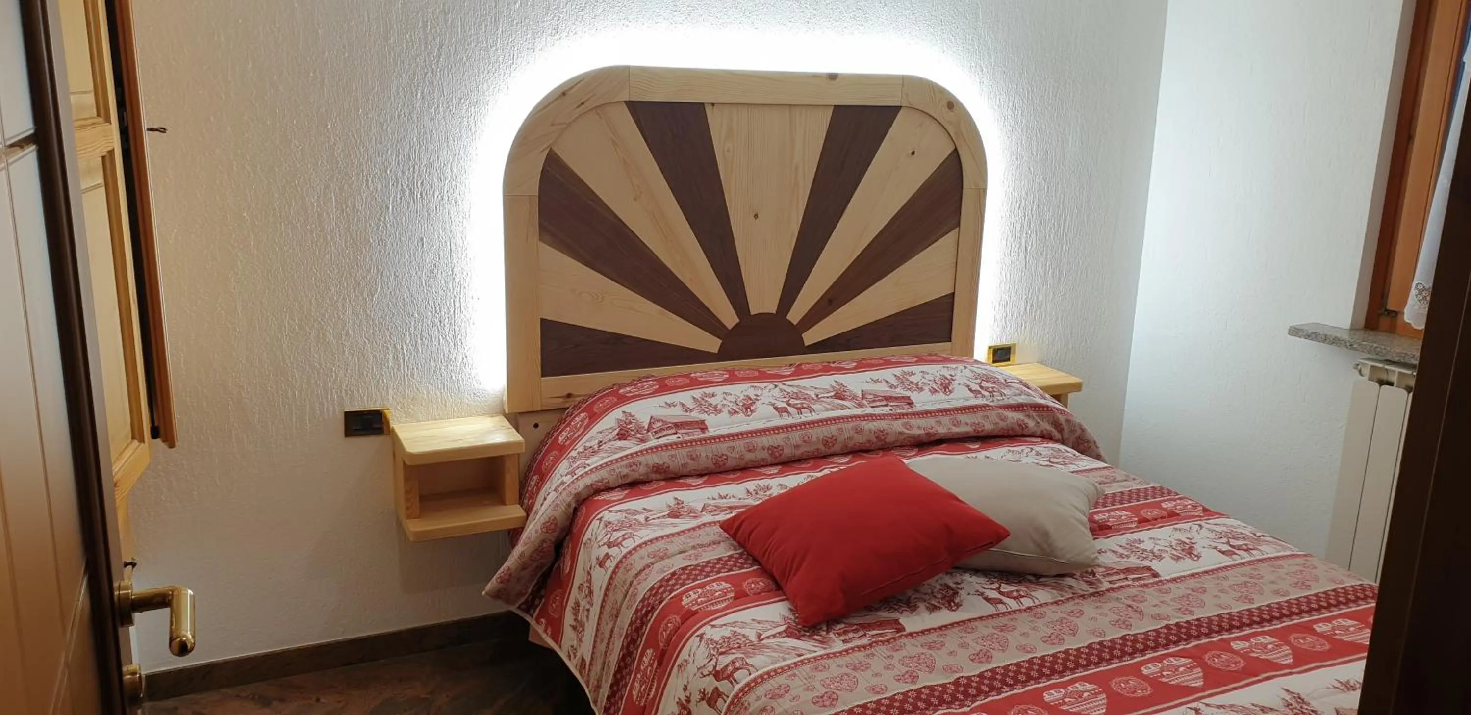 Bed in SUITE DEL VILLAGGIO