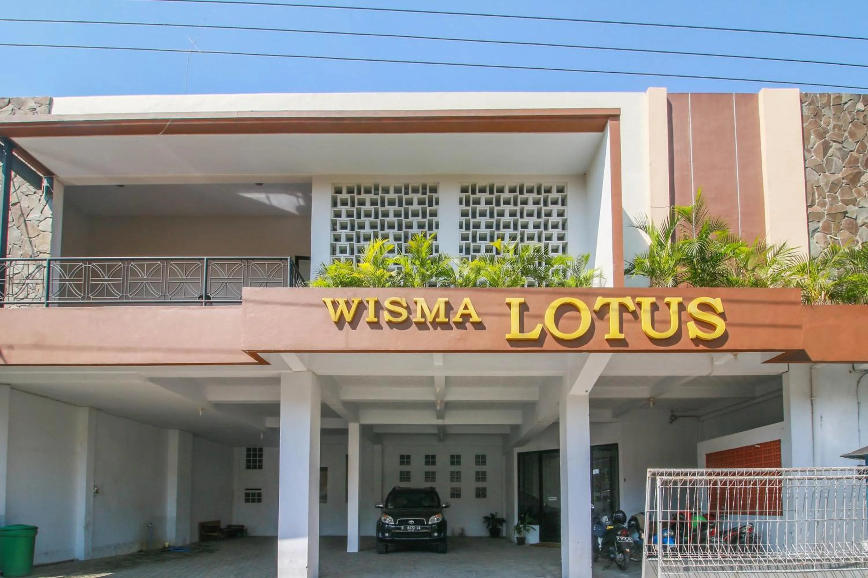 Property logo or sign in RedDoorz Syariah near Universitas Jenderal Soedirman