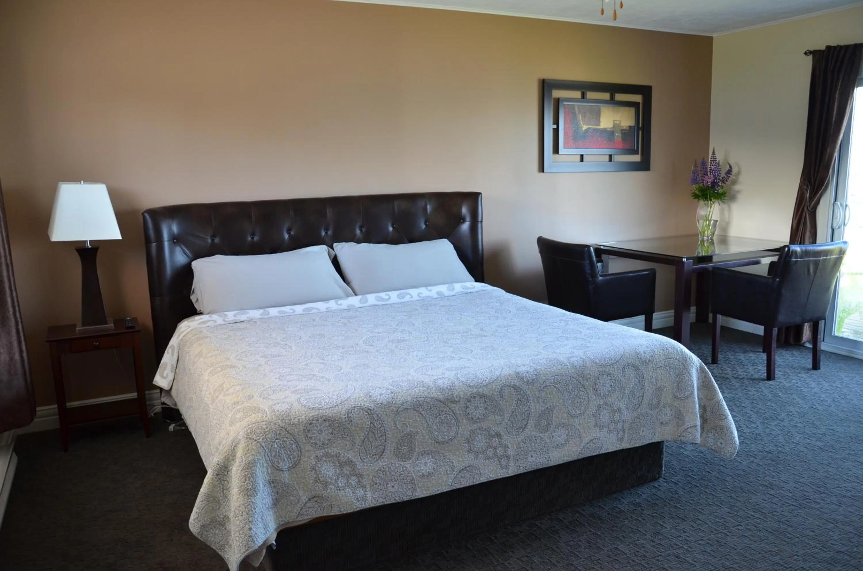 Bed in Clifty Cove Motel