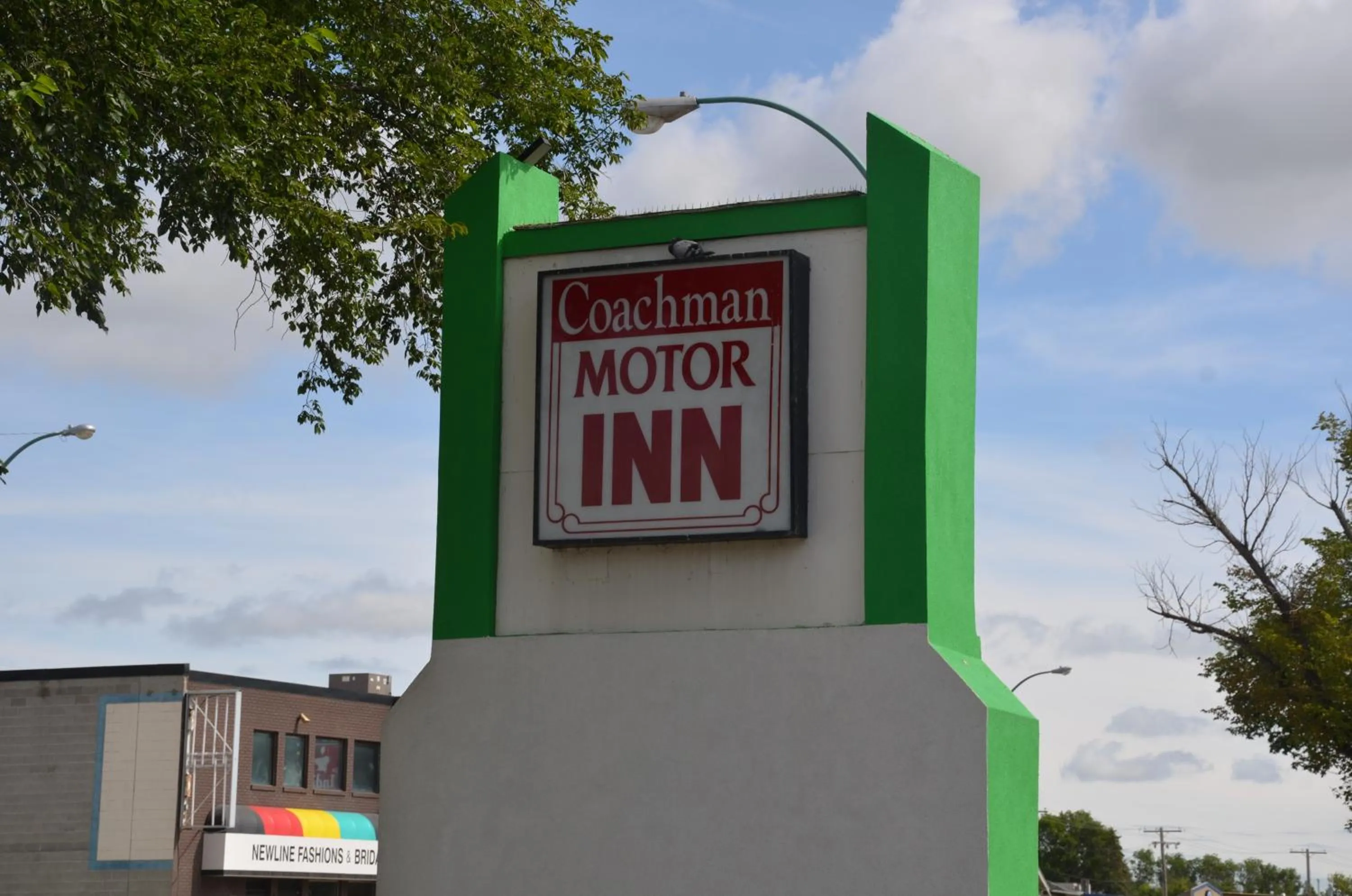 Facade/entrance in Coachman Inn