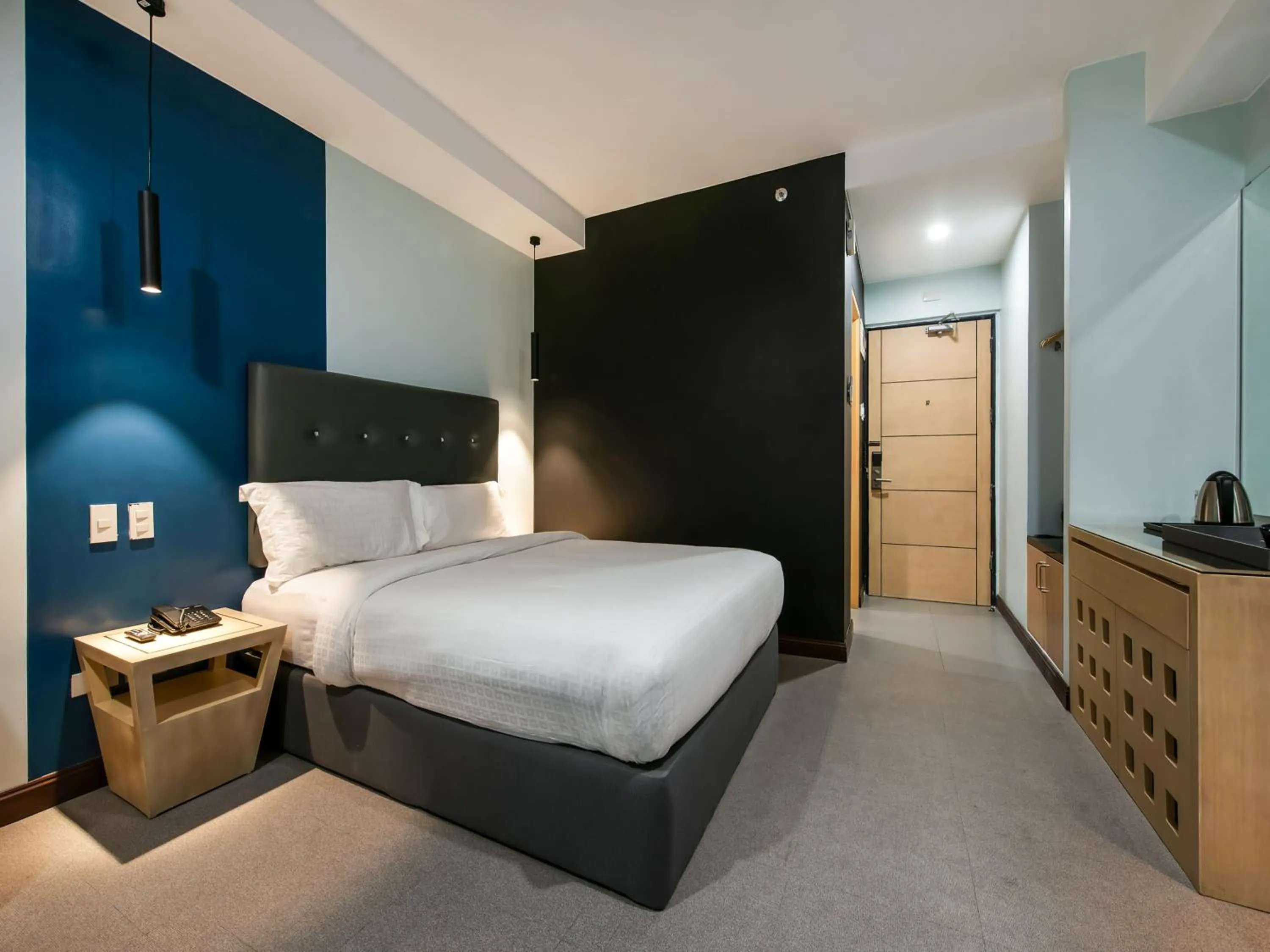 Bed in Bay Area Suites Manila