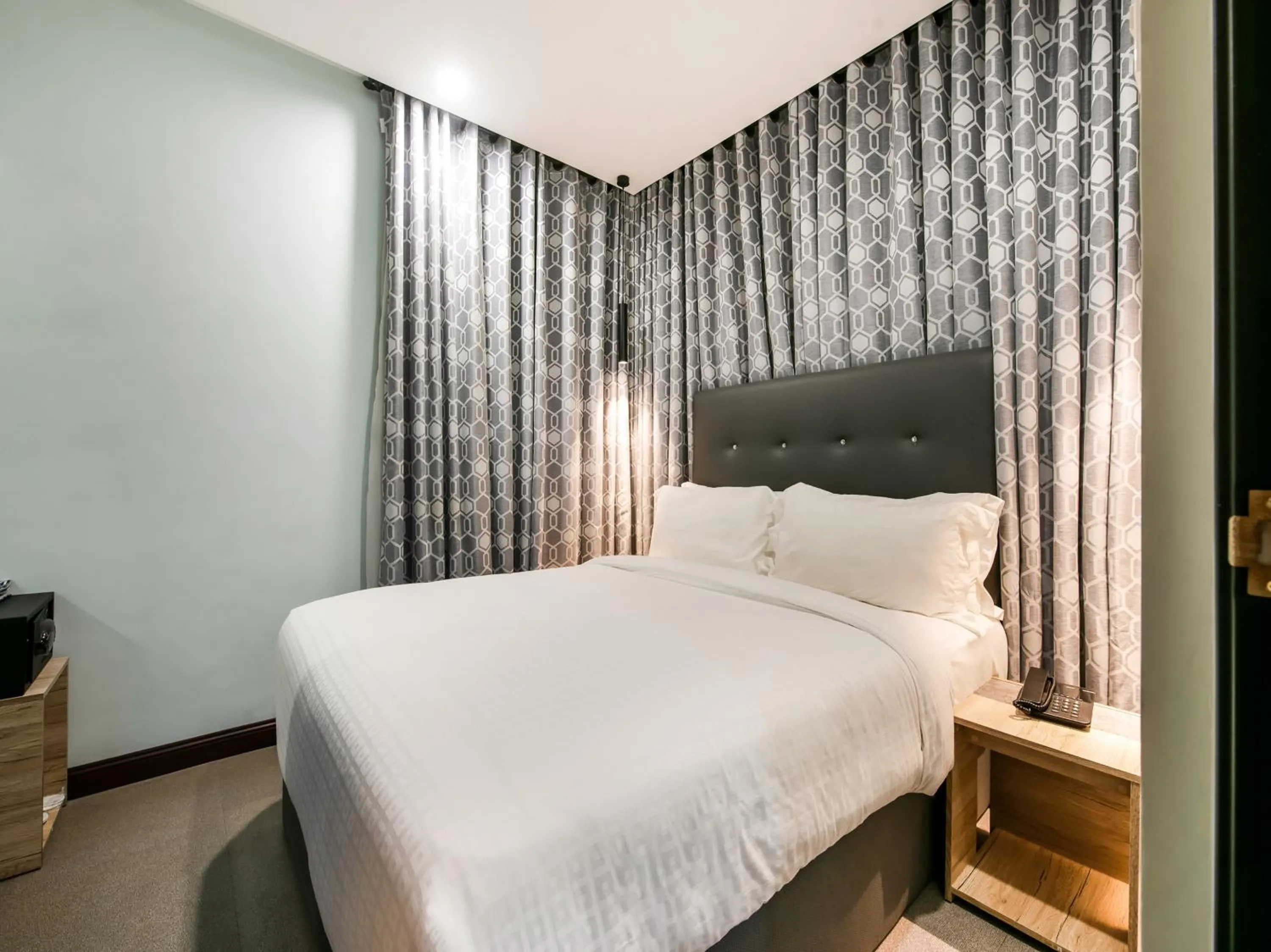 Bed in Bay Area Suites Manila