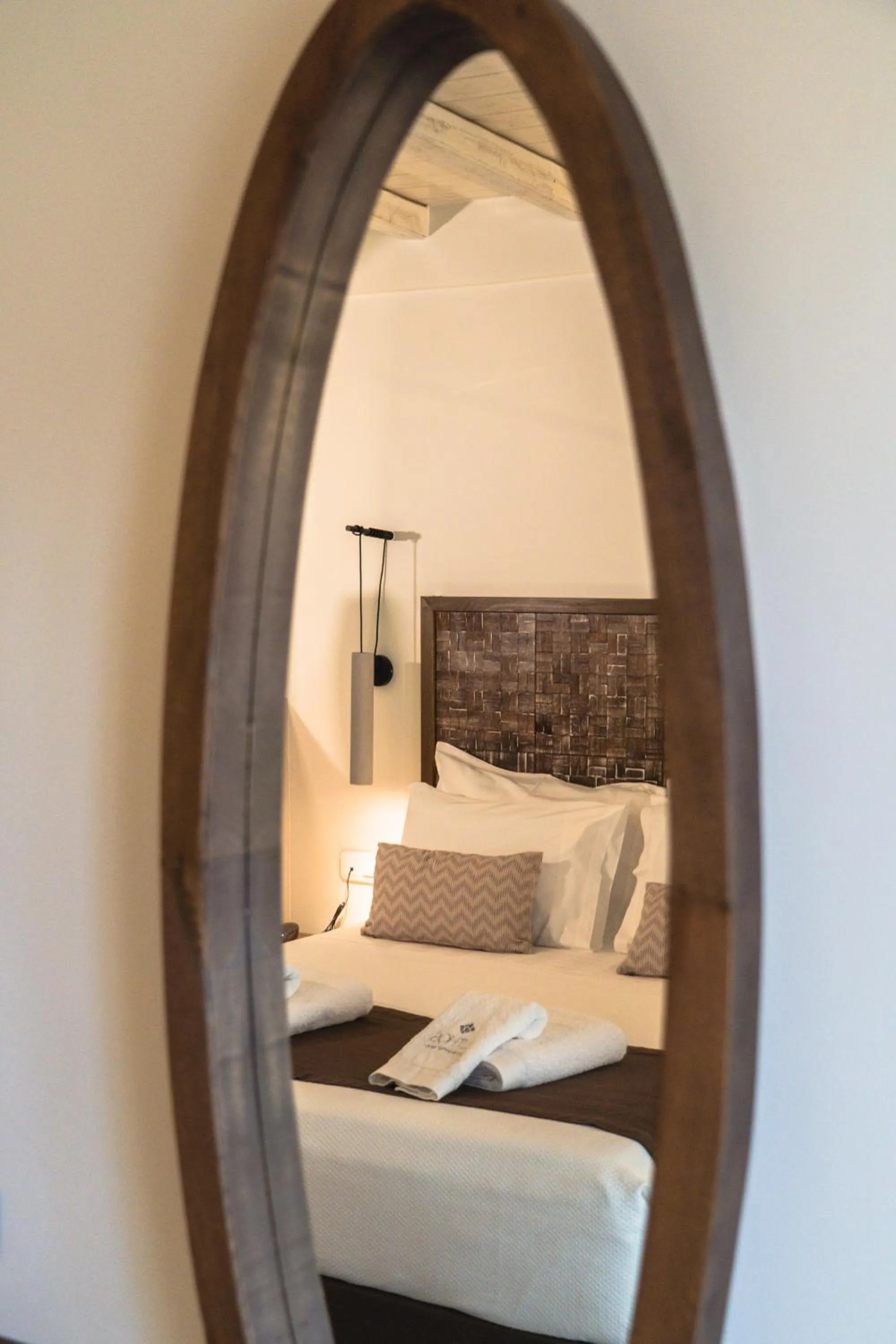 Bed in Lithos Luxury Suites