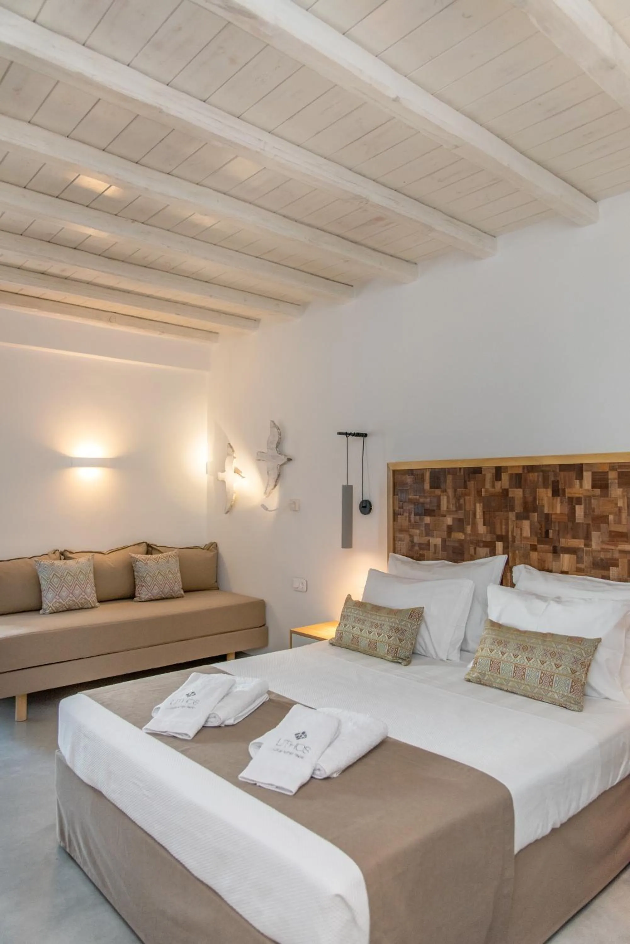 Bed in Lithos Luxury Suites