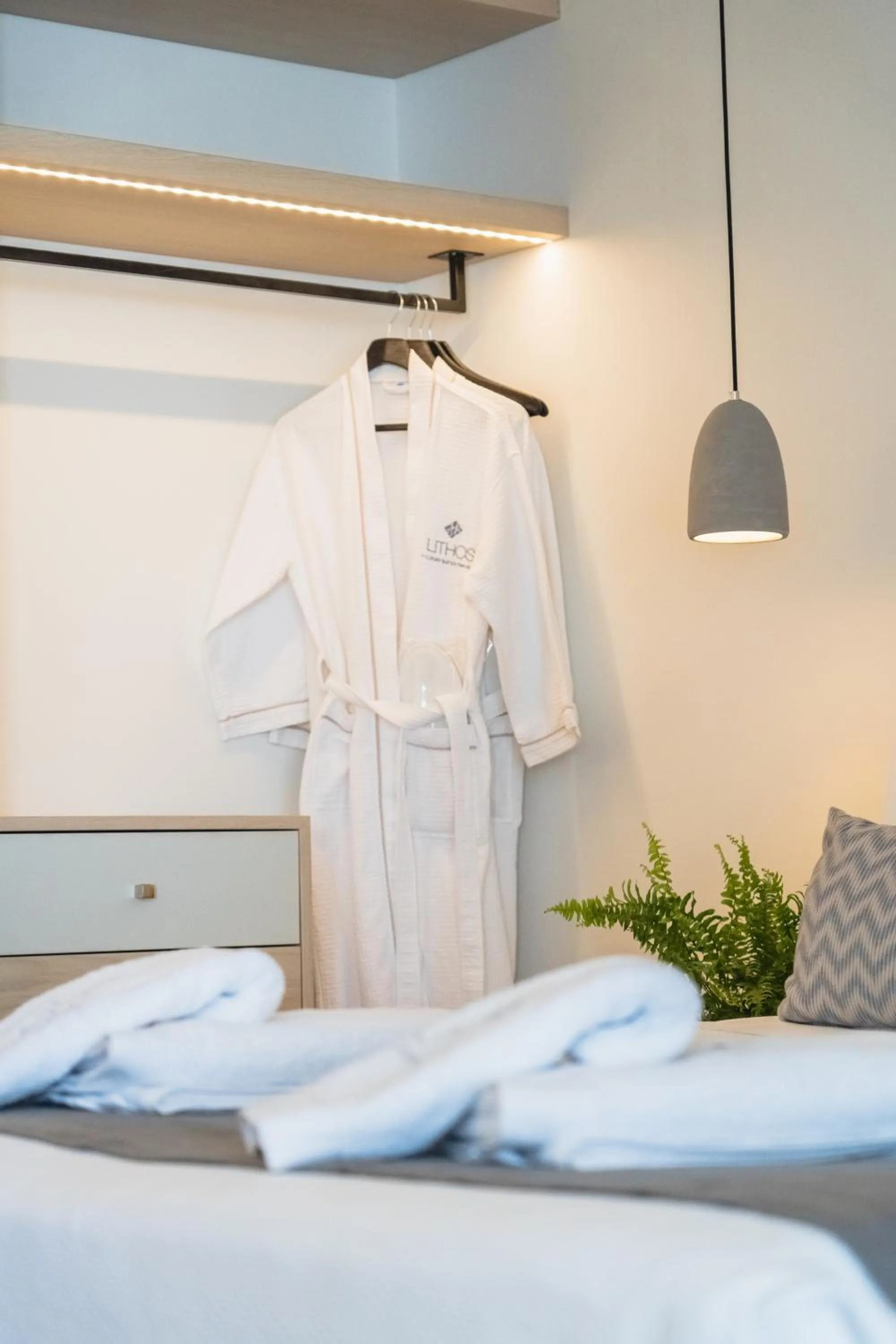 Bed in Lithos Luxury Suites